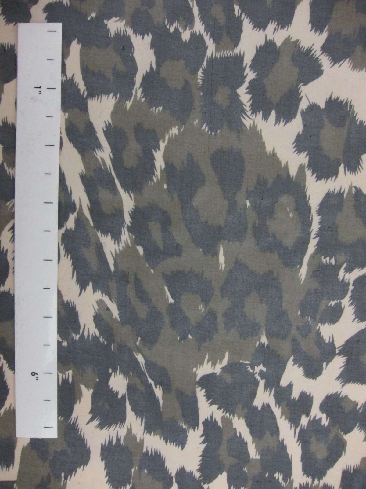 Printed Silk Chiffon Black Spots With Green In the Center Of The Spots On Green Light-Brown Background