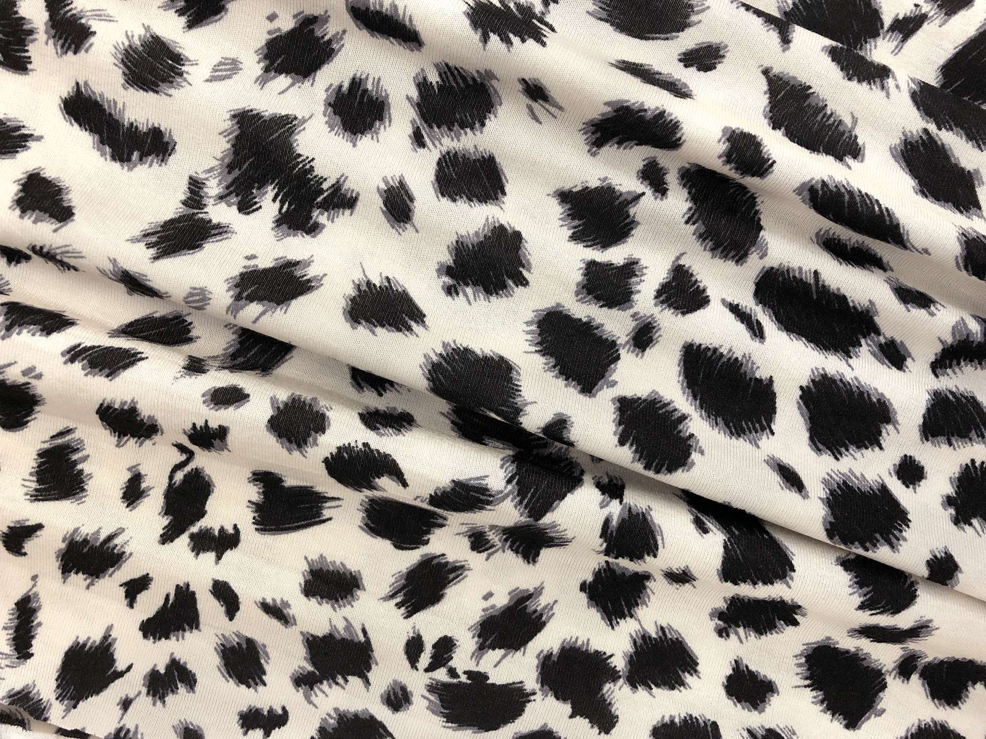 Rayon Jersey with Snow Leopard Print in Bone and Black