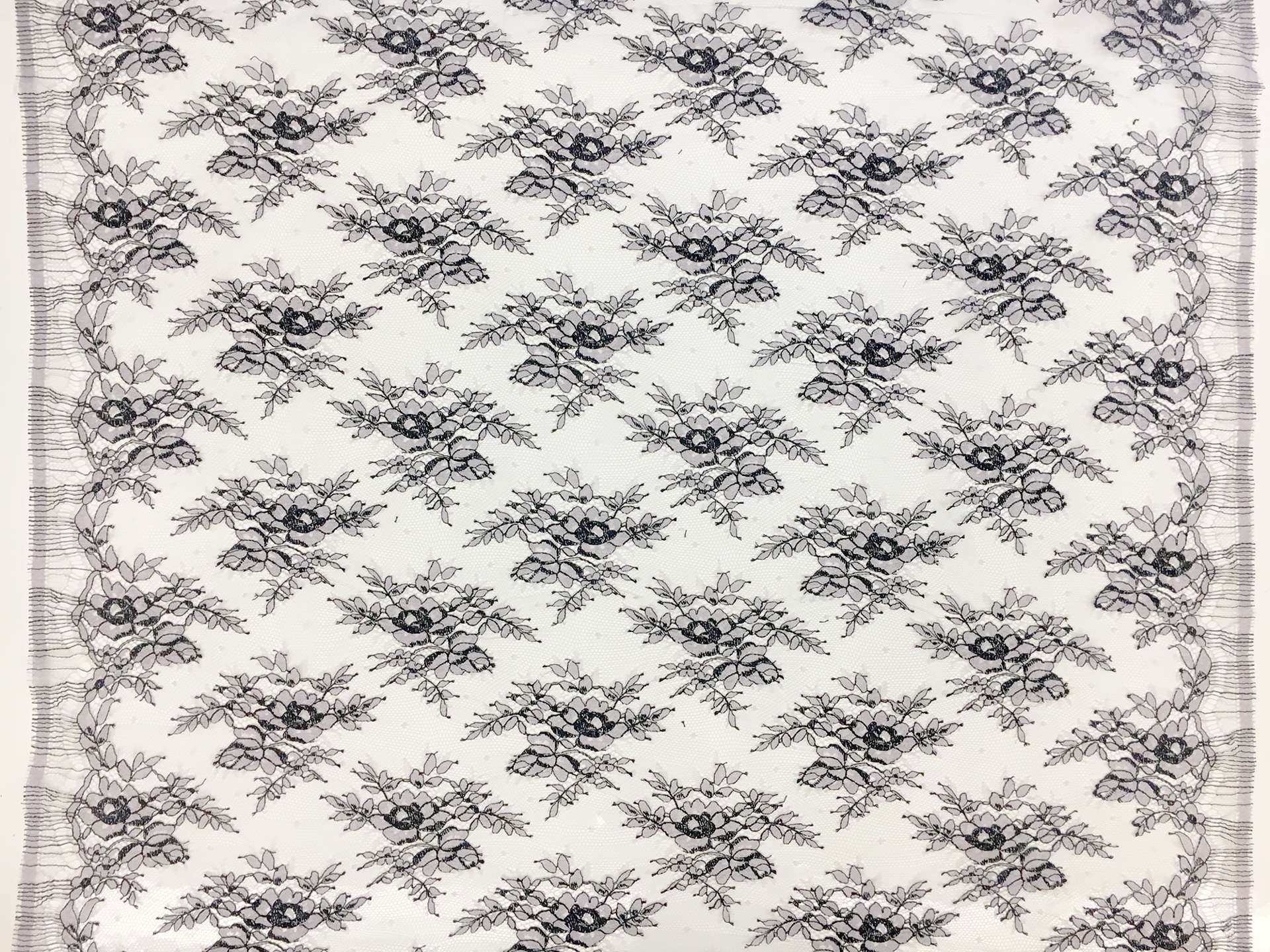 Chantilly Lace in Light Lavender with Black Outlines of Florals