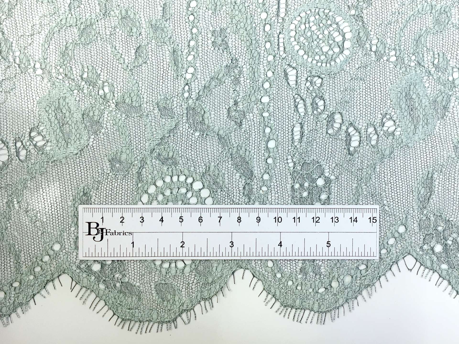 French Chantilly Lace with Circles and Floral Motifs in Sea Green and Black