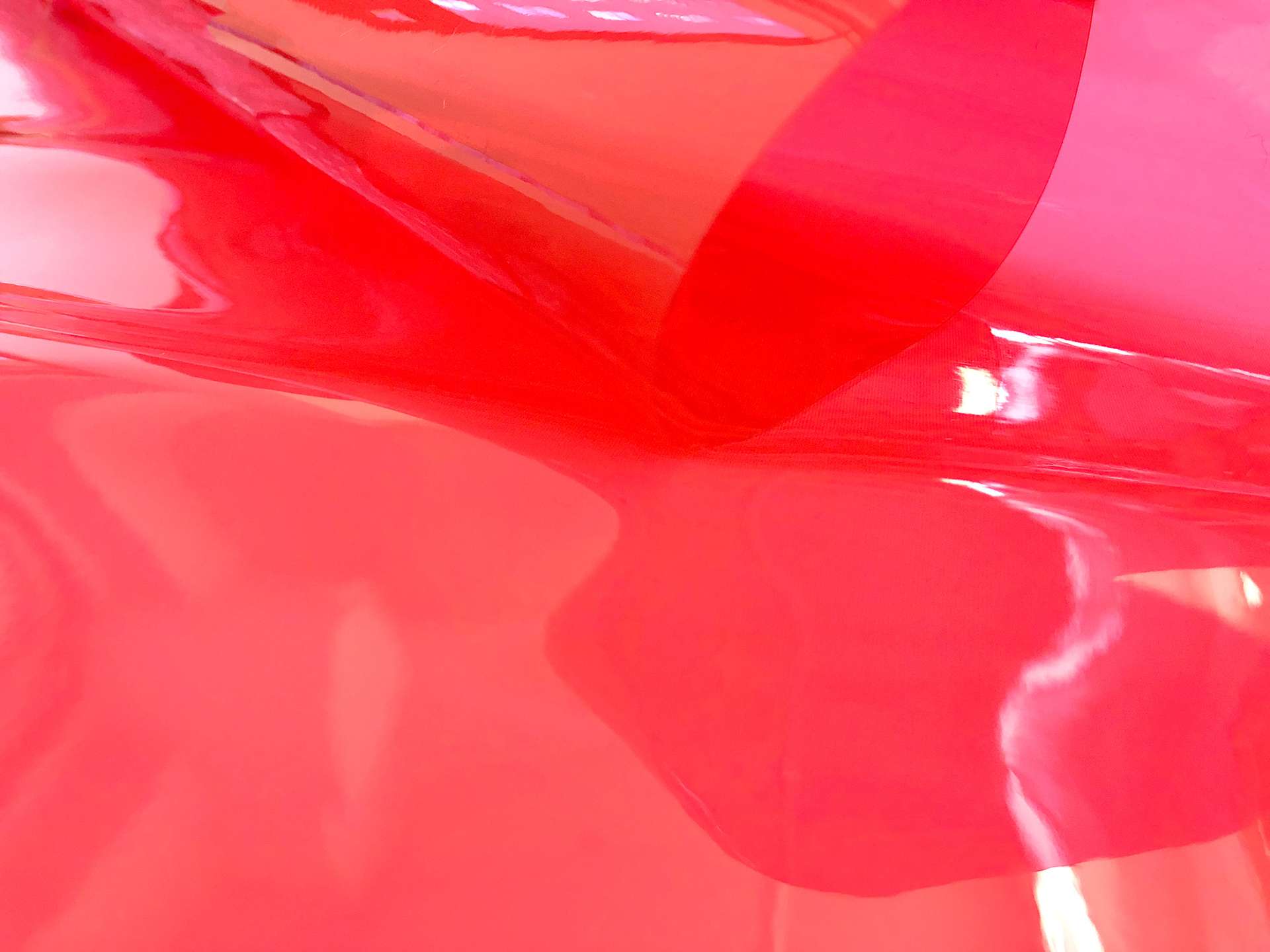 Clear Tinted Plastic in Crimson