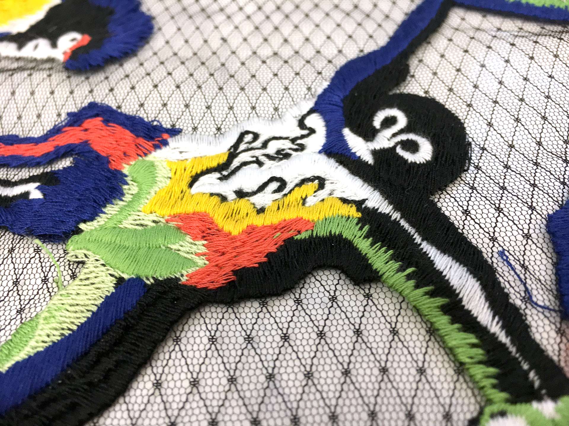 Black Netting with Colorful Embroidered Monkeys