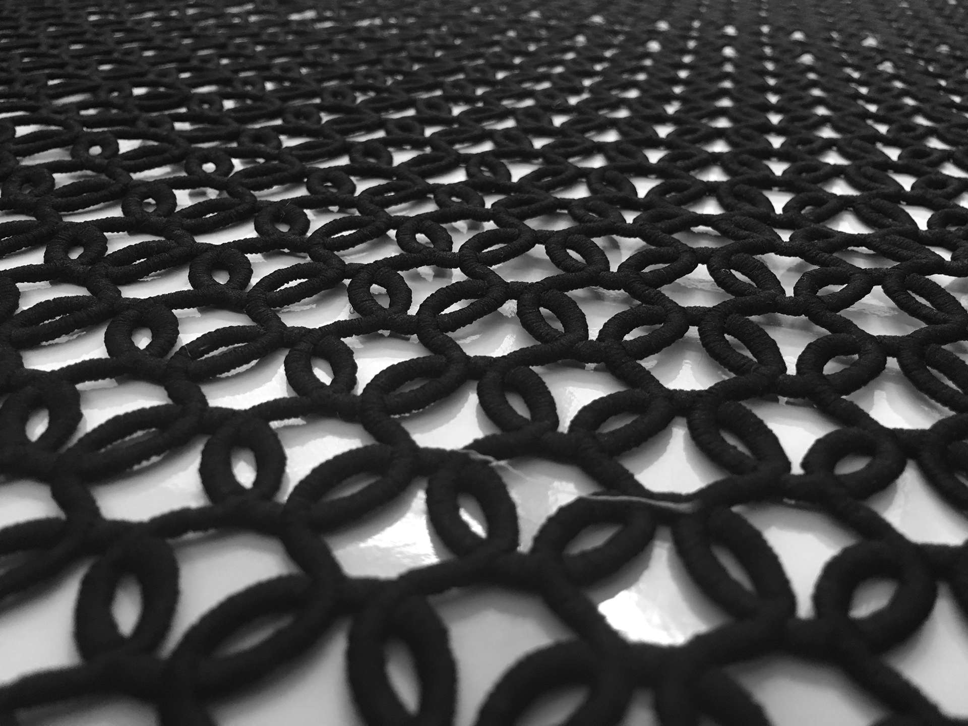 Guipure Lace with Interlocking Circle Motif in Black
