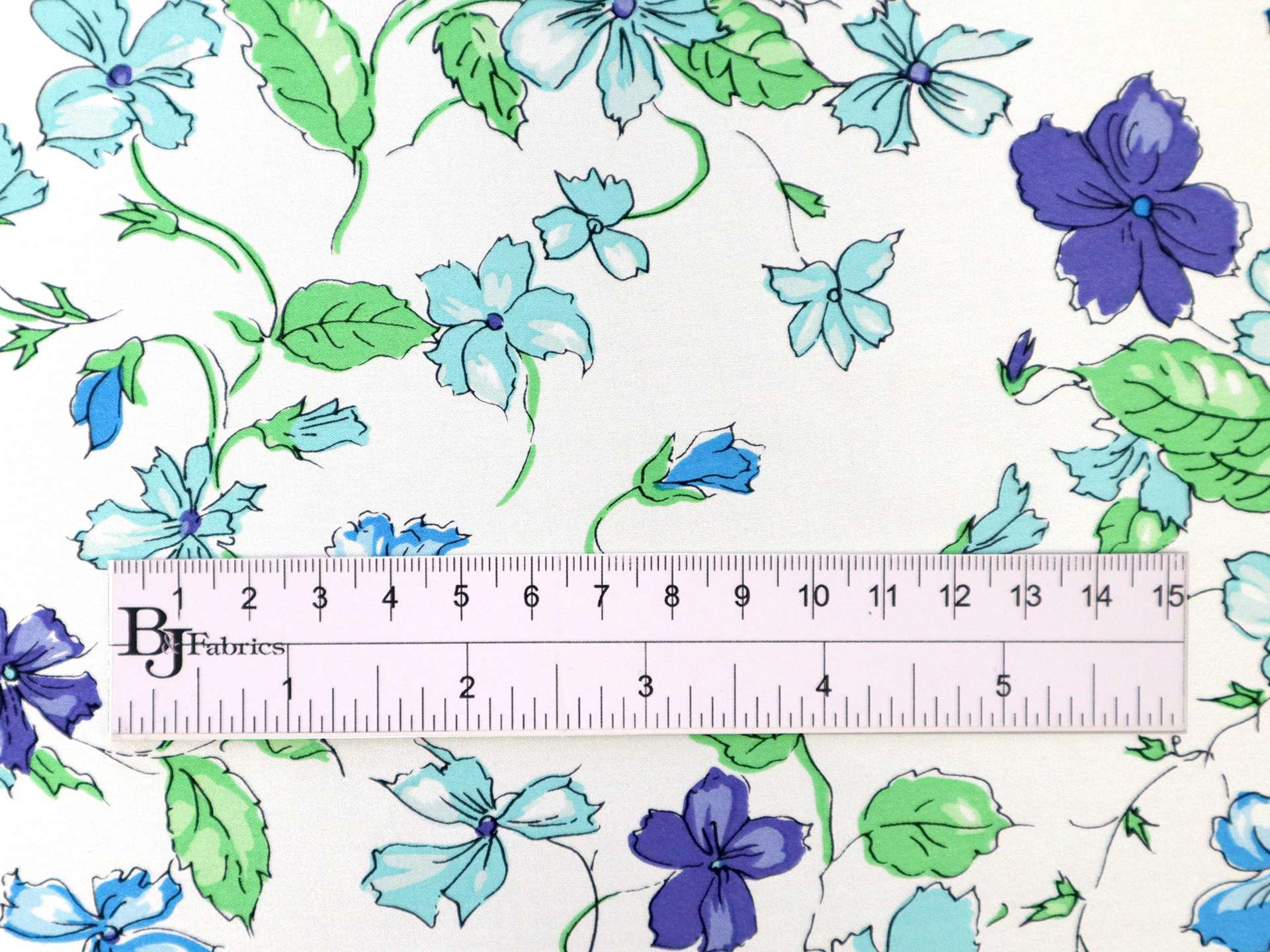 Printed Silk Charmeuse with Floral Pattern on Blue Green Background