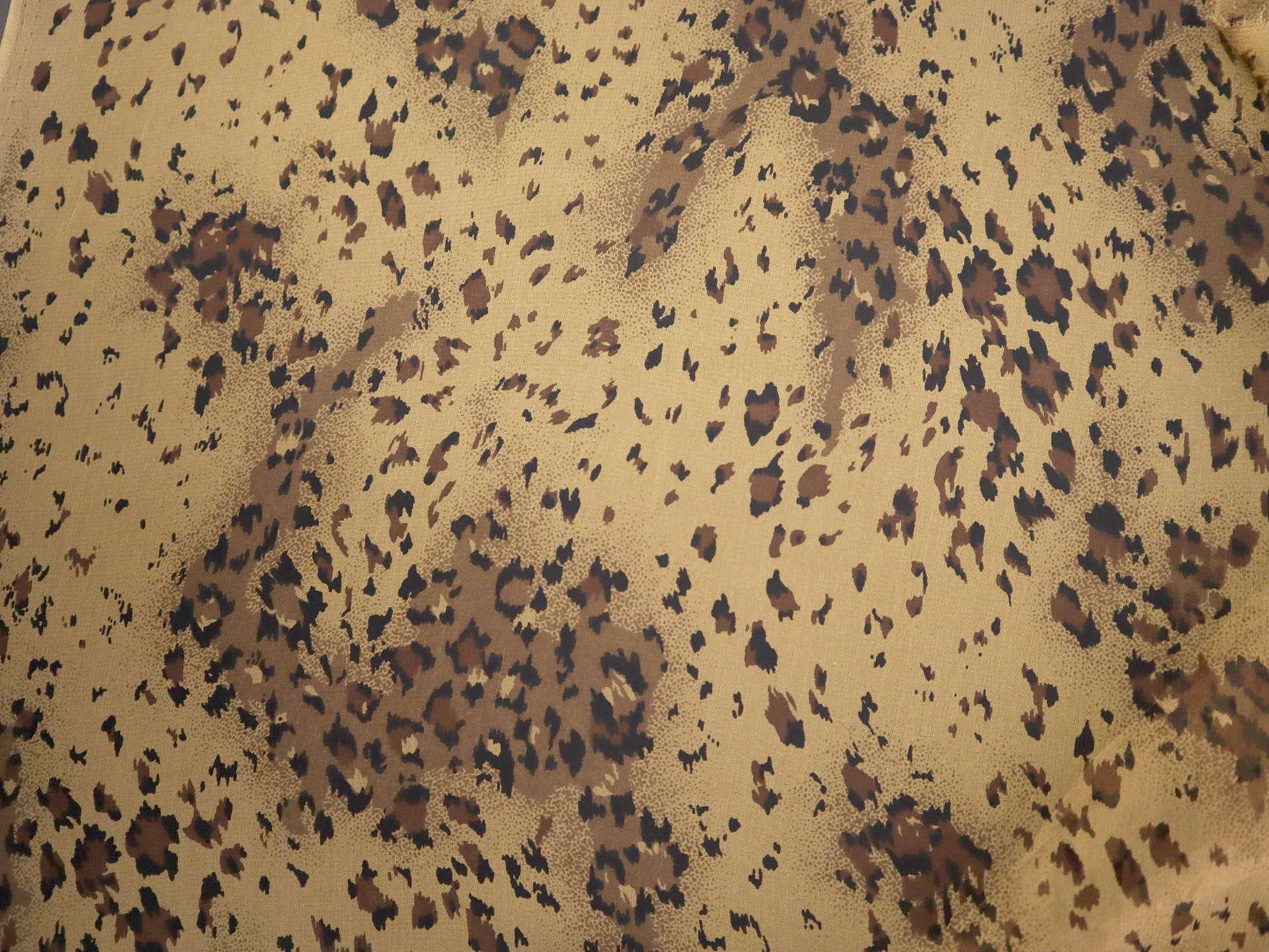 Printed Silk Chiffon with Leopard Spots Animal Print On Orange Background