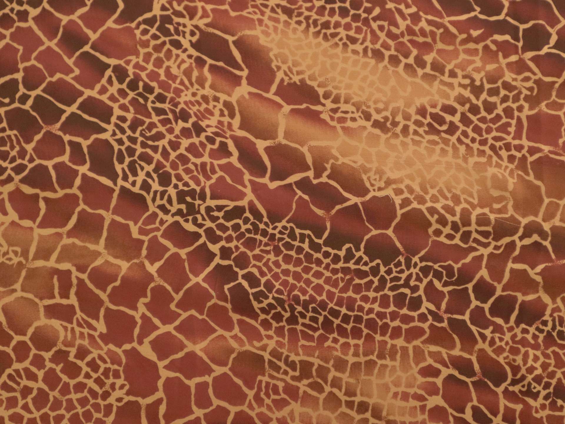 Printed Silk Chiffon with Animal Print On Orange-Red Background