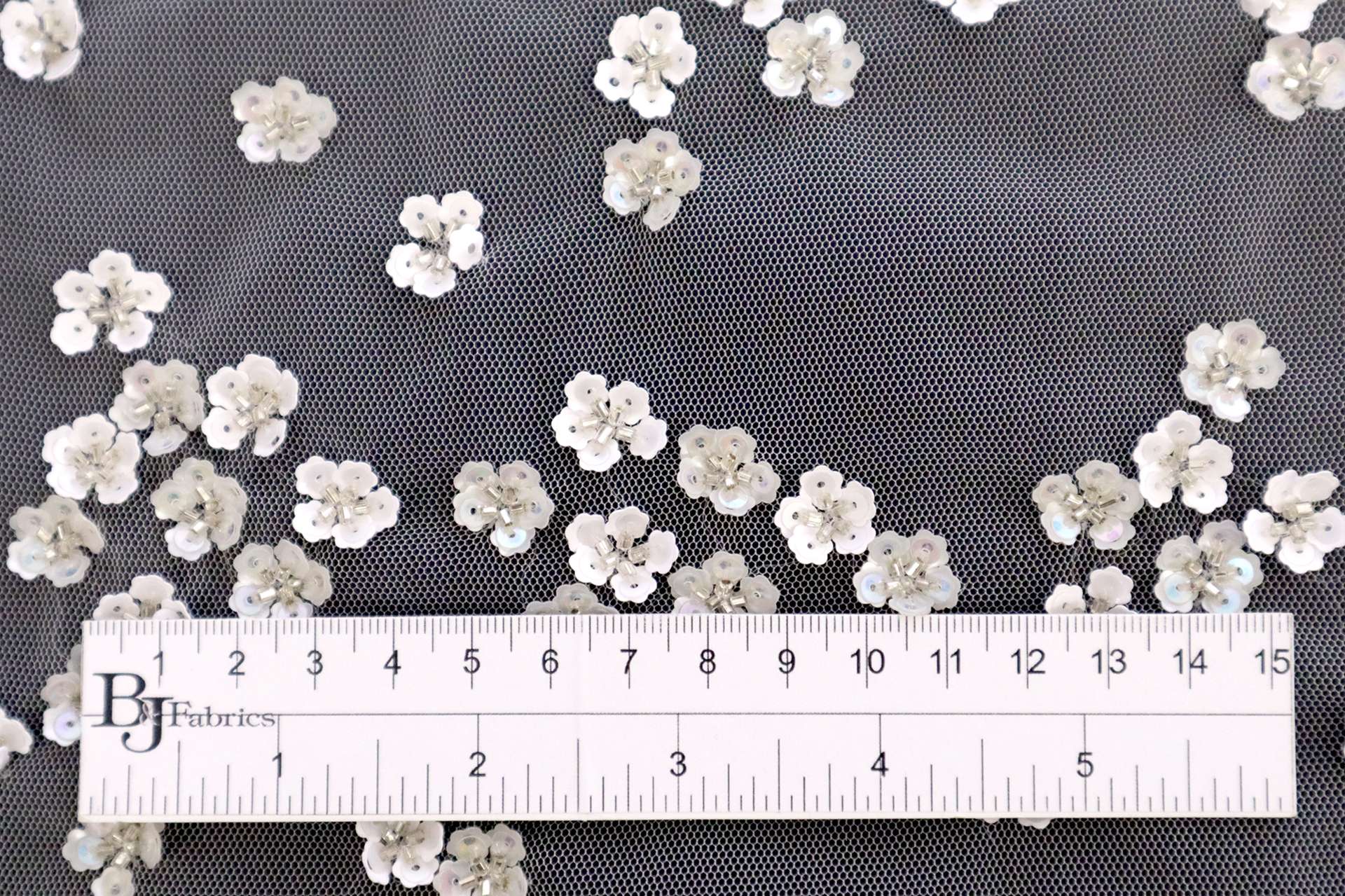 Novelty Sequined Flowers on Acid Green Tulle