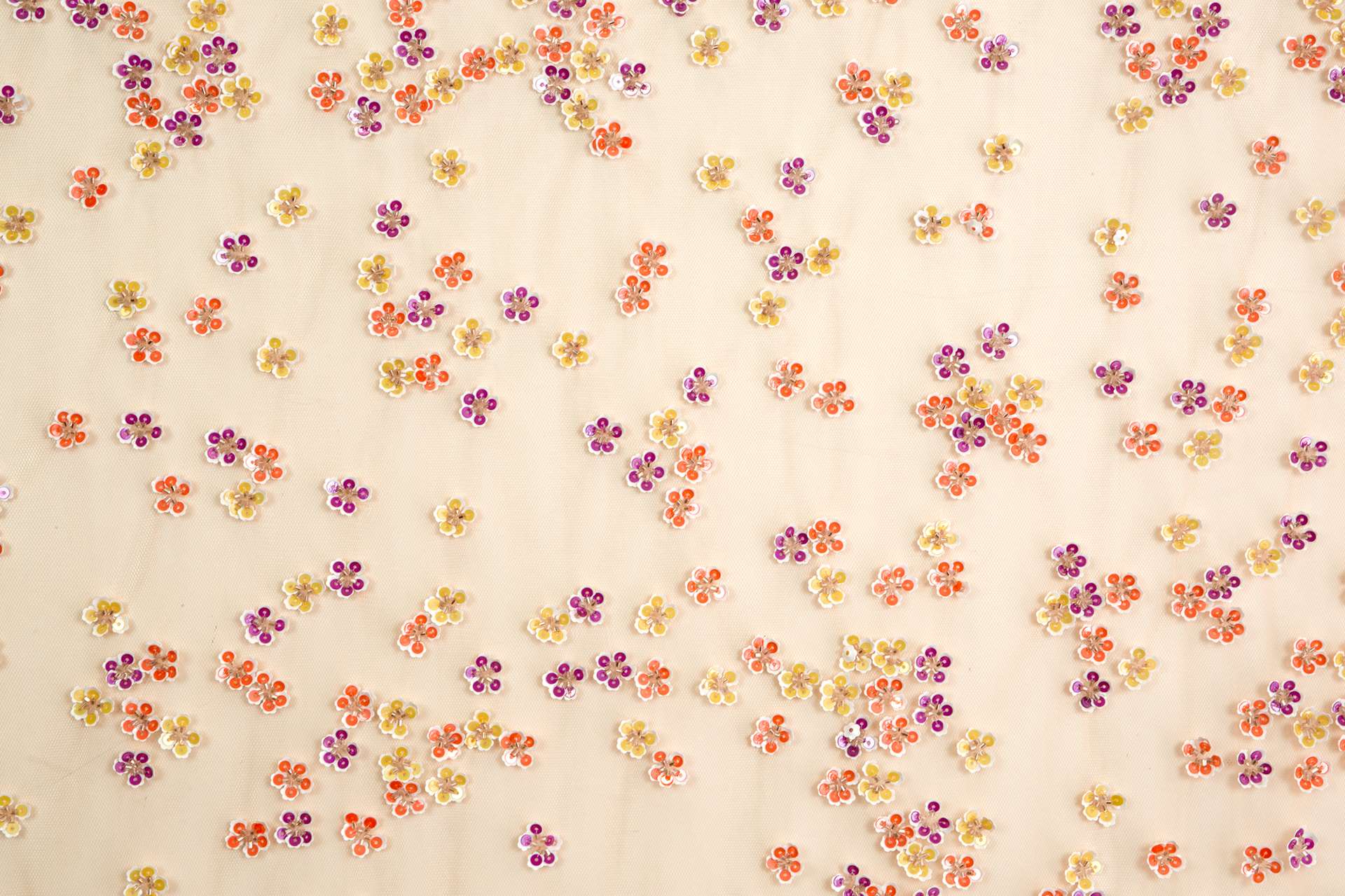 Novelty Sequined Flowers on Peach Tulle