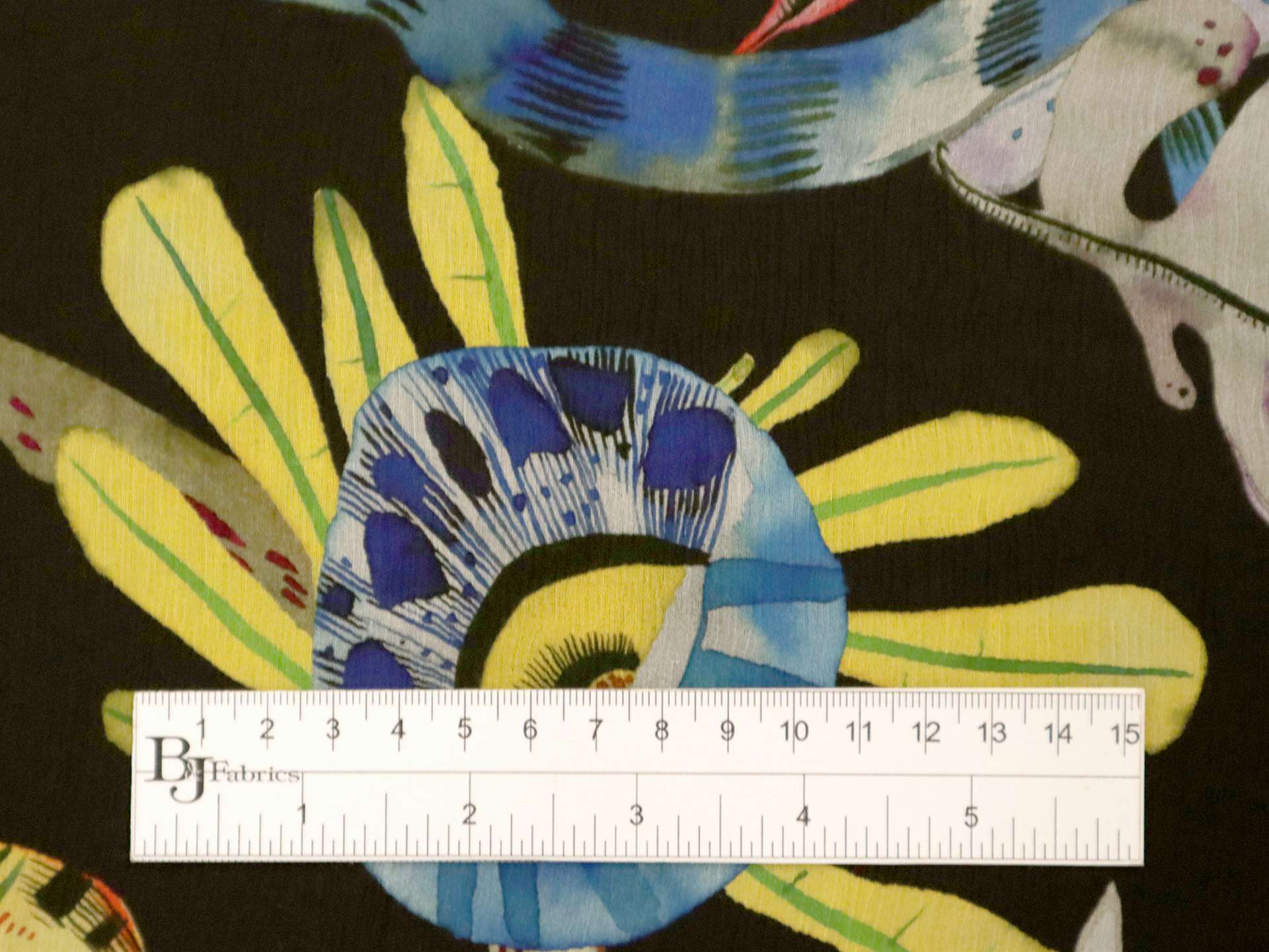 Crinkled Silk Chiffon with Floral & Animal Print On Black Background