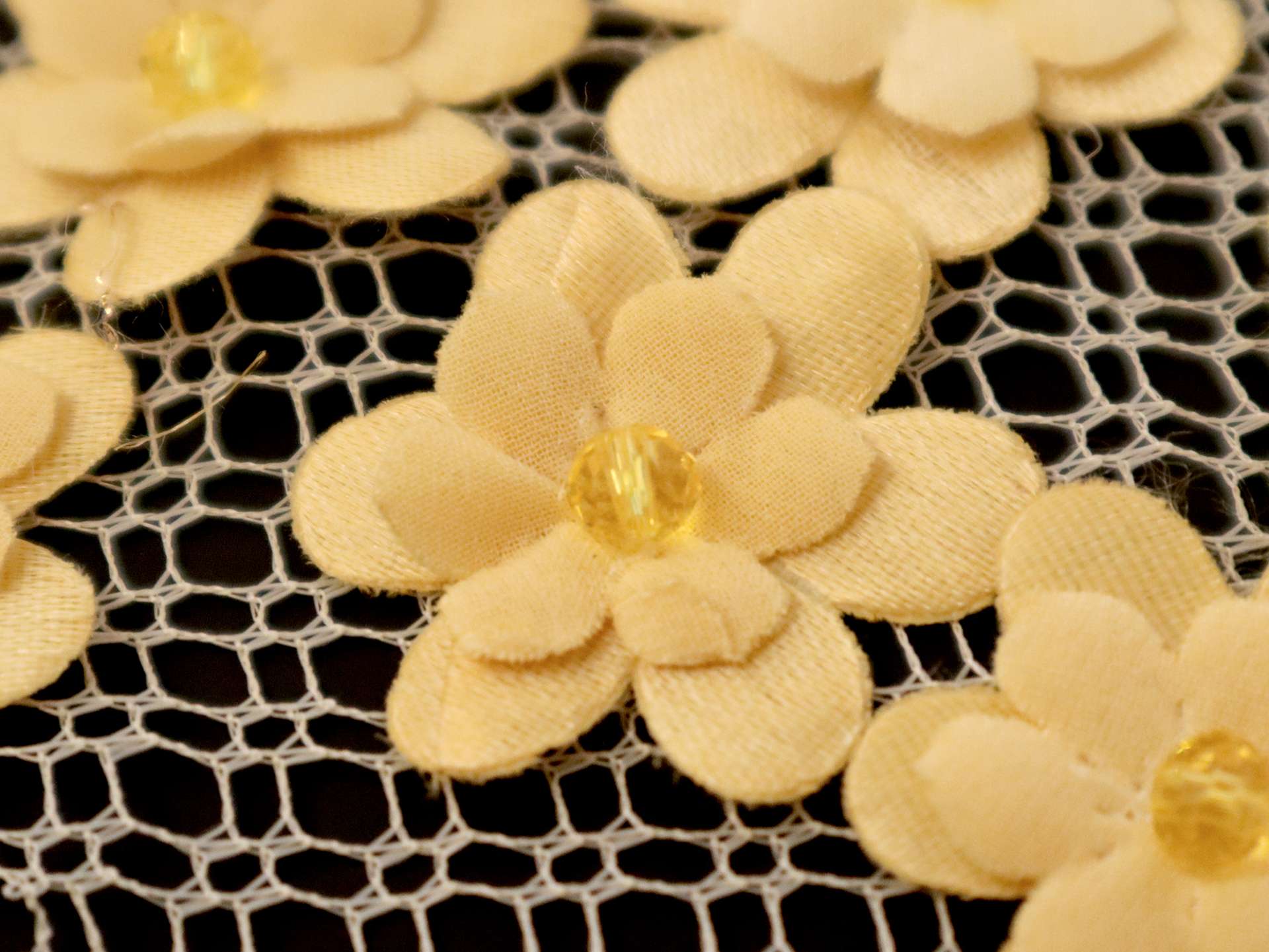 Mini Floral Appliqués on Netting in Yellow