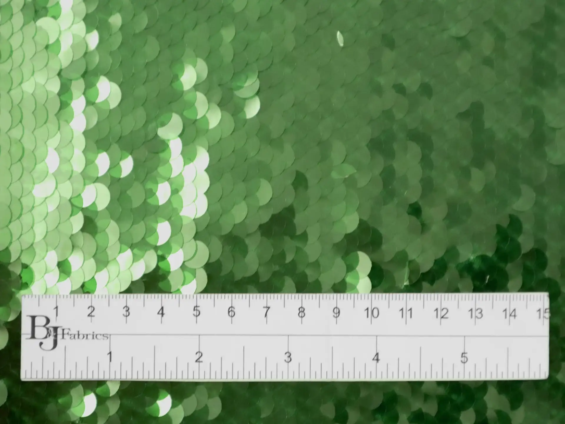 Transparent Mini-Paillettes on Stretch Tulle in Green