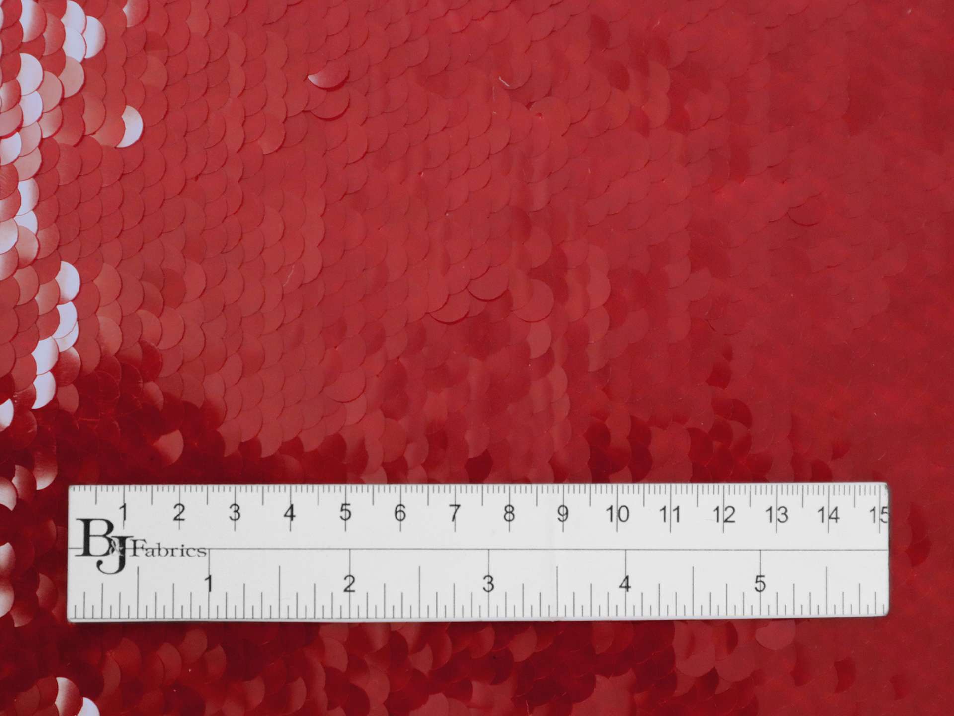 Transparent Mini-Paillettes on Stretch Tulle in Red
