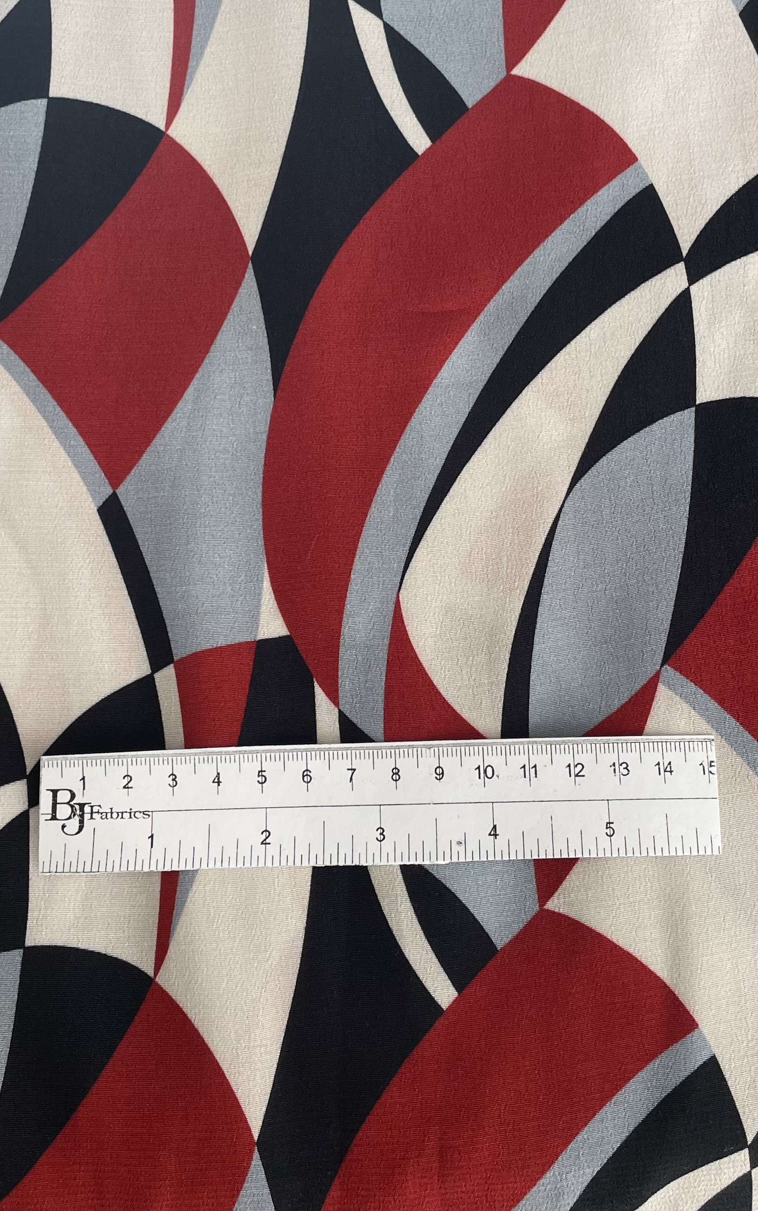 Made in Italy 100% Viscose Challis Deco Print in Red Multi