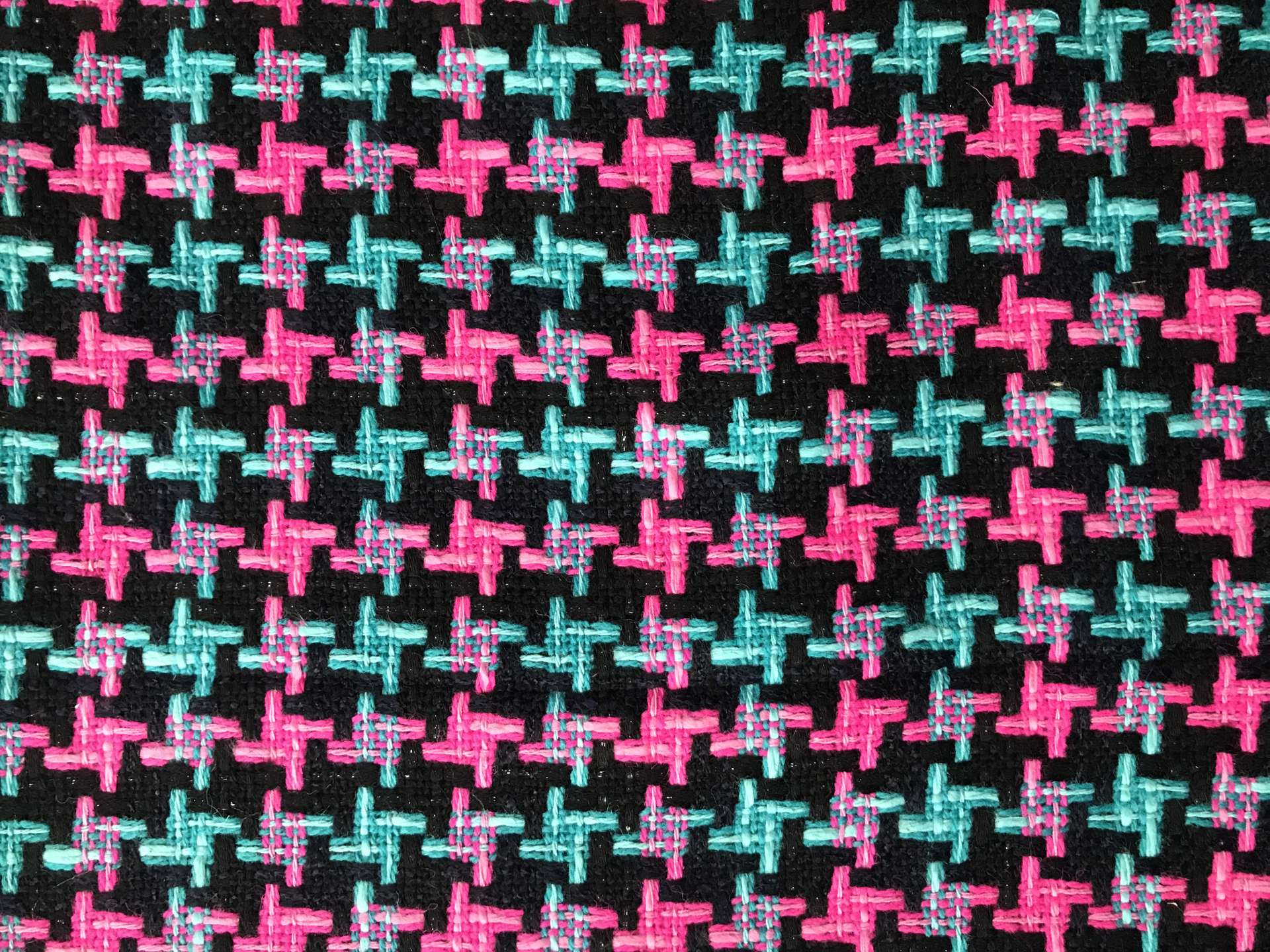tweed with herringbone patterns in turquoise and fuchsia
