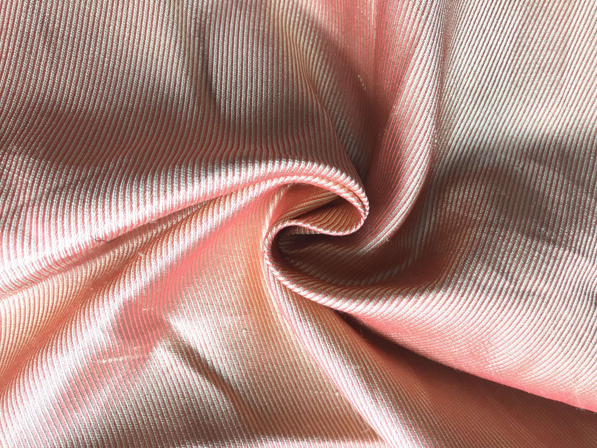 silk taffeta in a swirl to show the iridescence