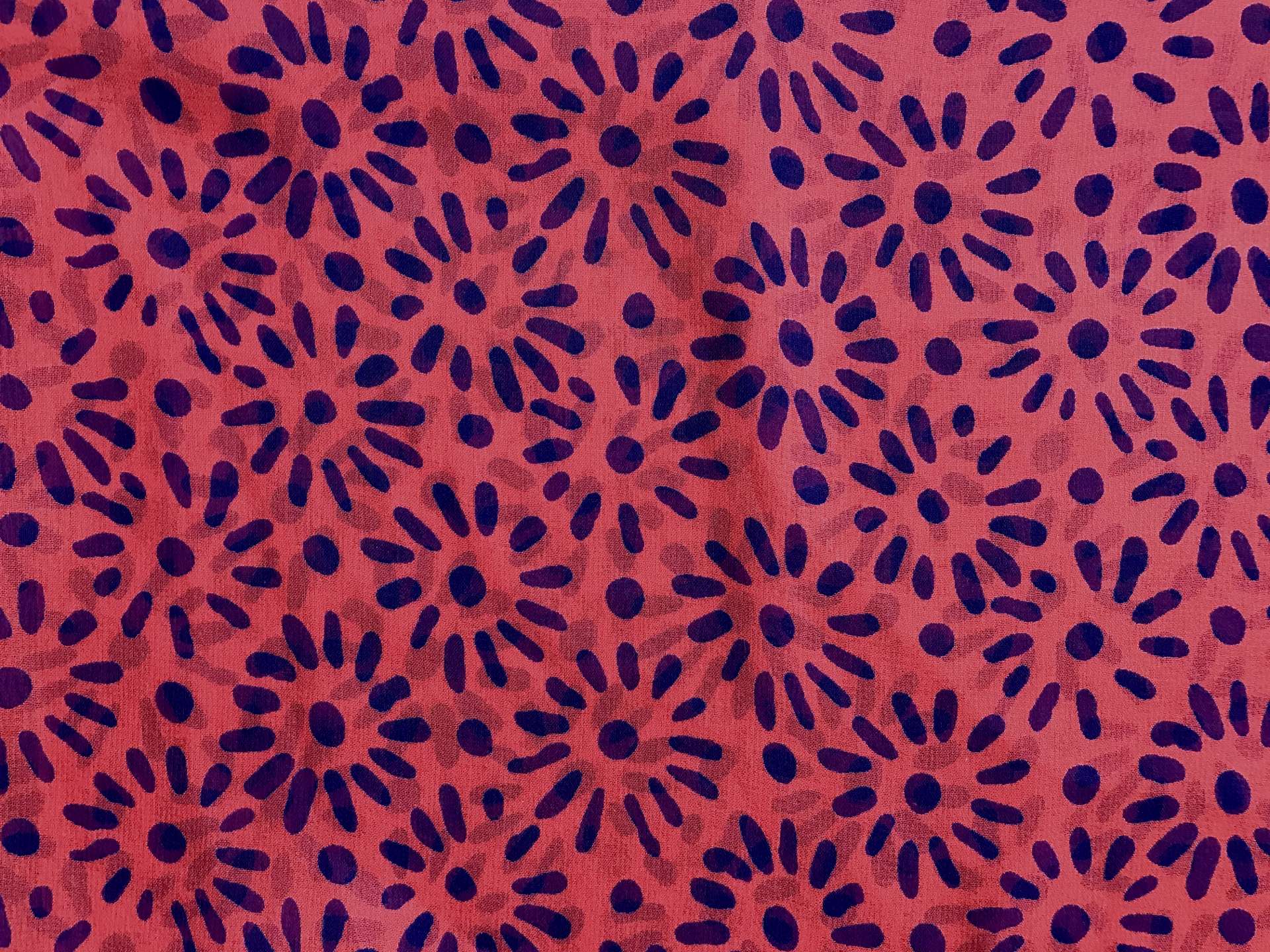 Red silk chiffon with navy floral sunburst pattern