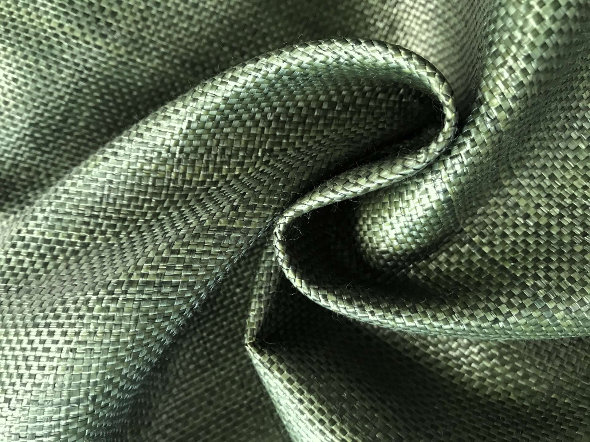 green raffia is scrunched up to show weight and texture