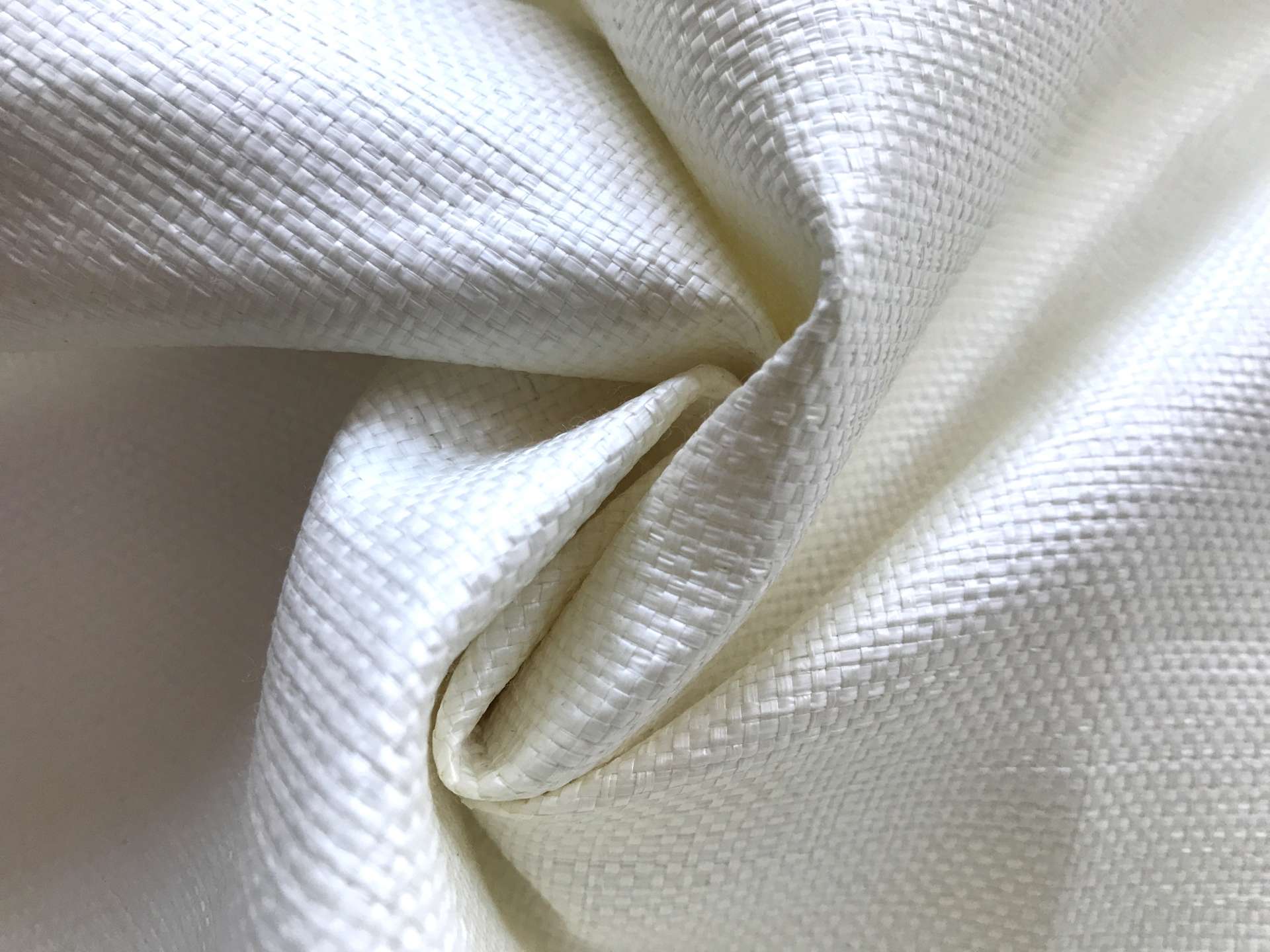 white raffia scrunched up to show weight and texture