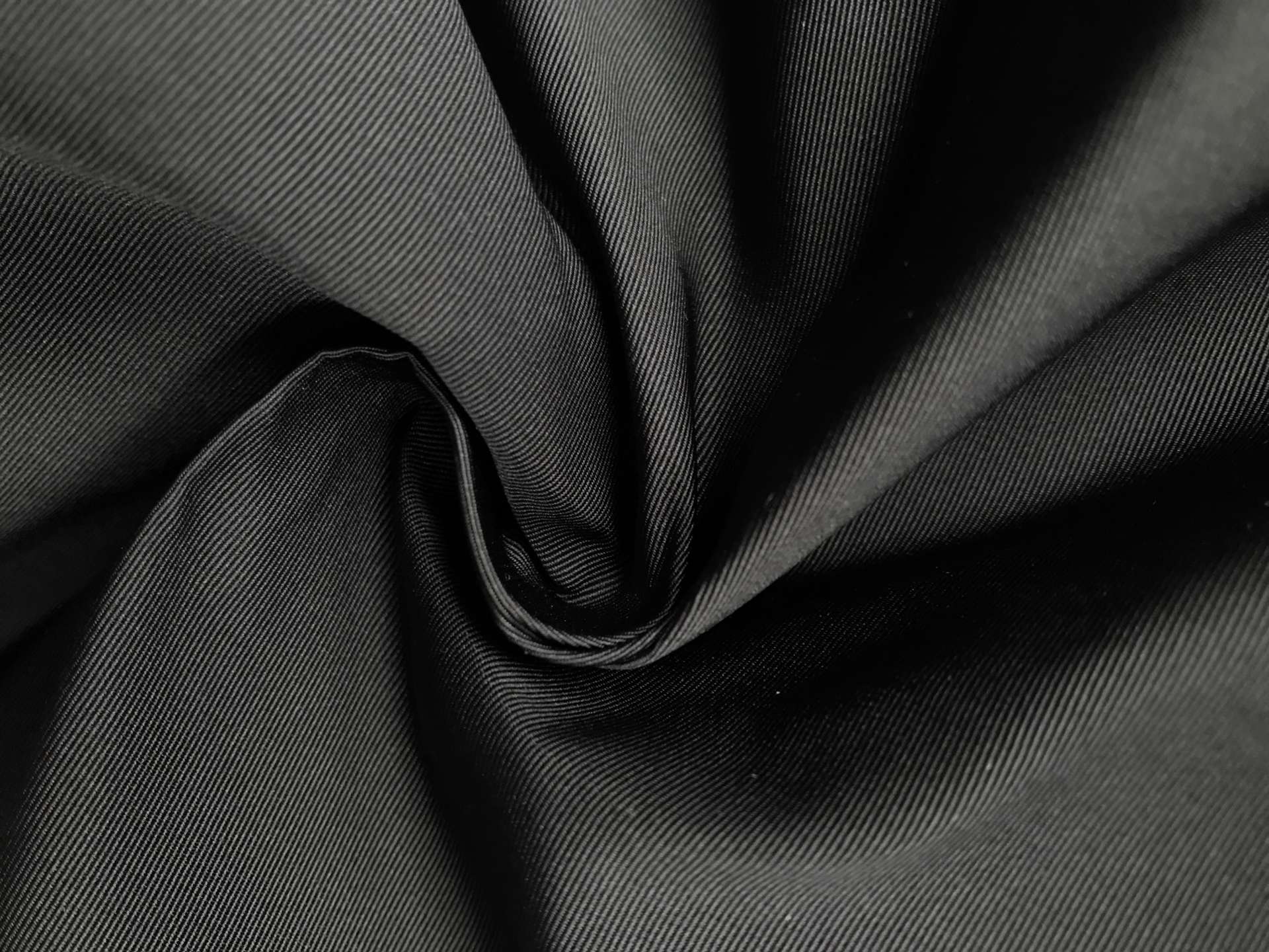 black poly gros de londres in a swirl