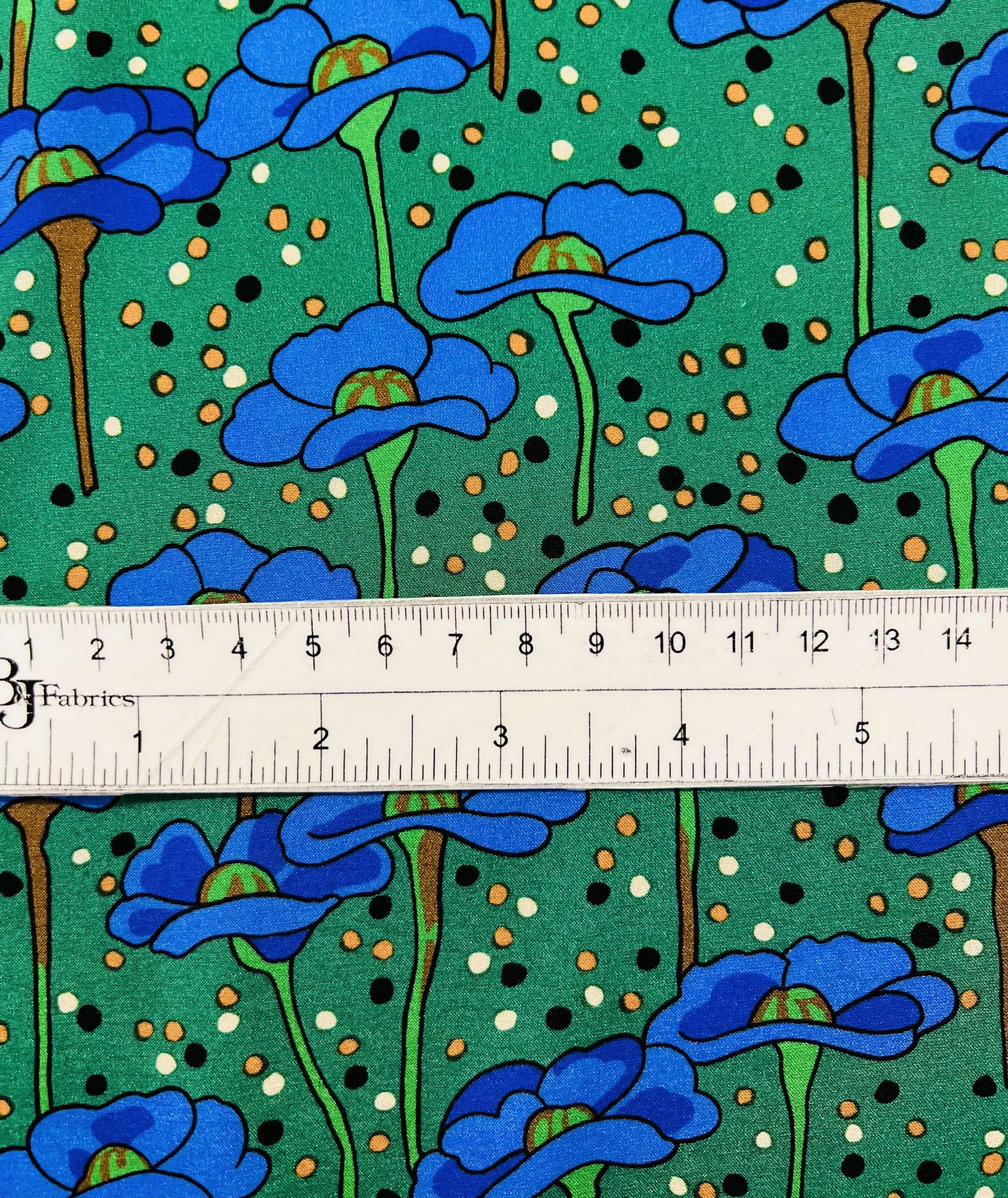 Printed Stretch Silk Charmeuse (Matte Side) on Dark Green