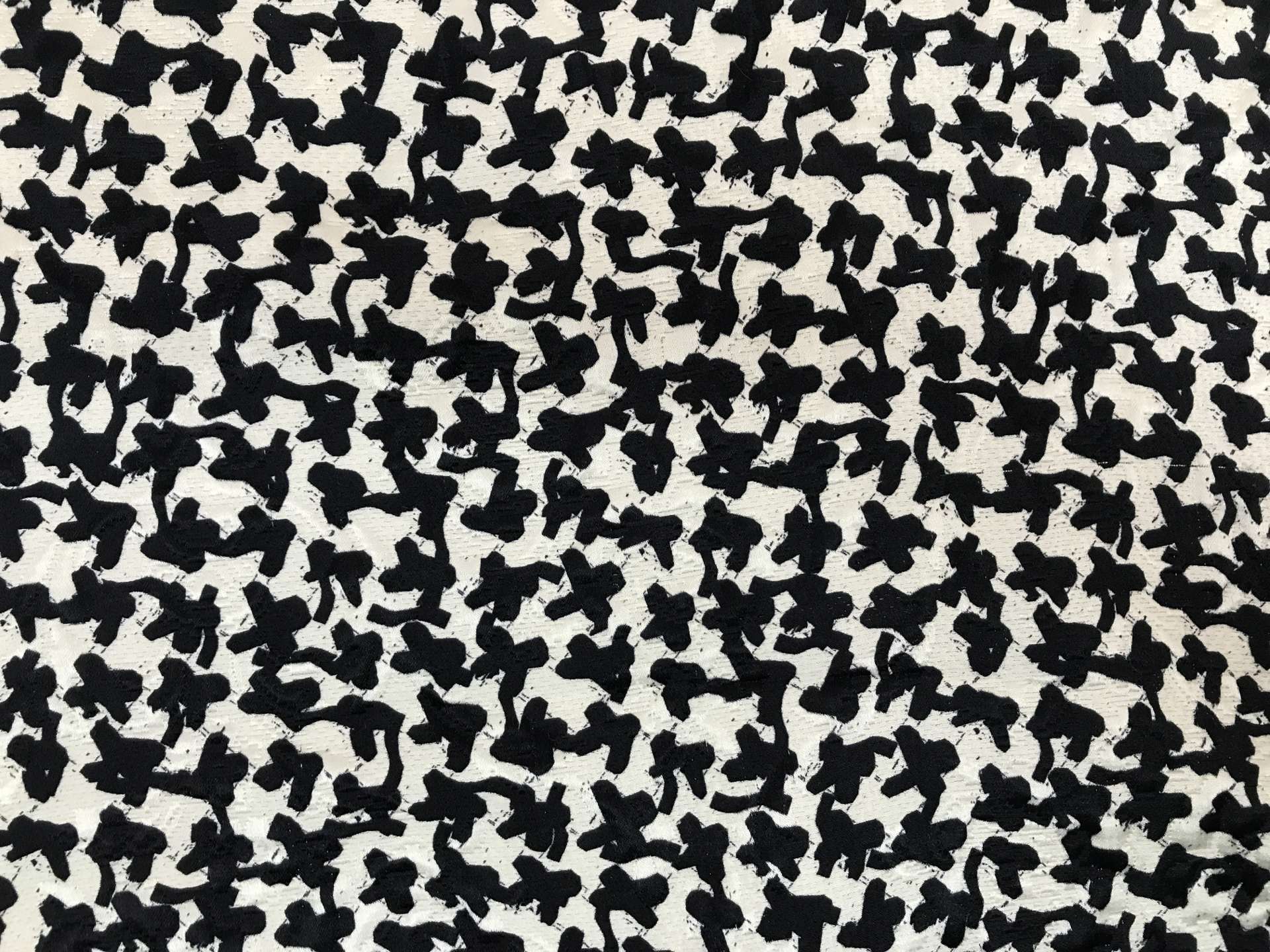 Silk and wool brocade with deconstructed houndstooth pattern