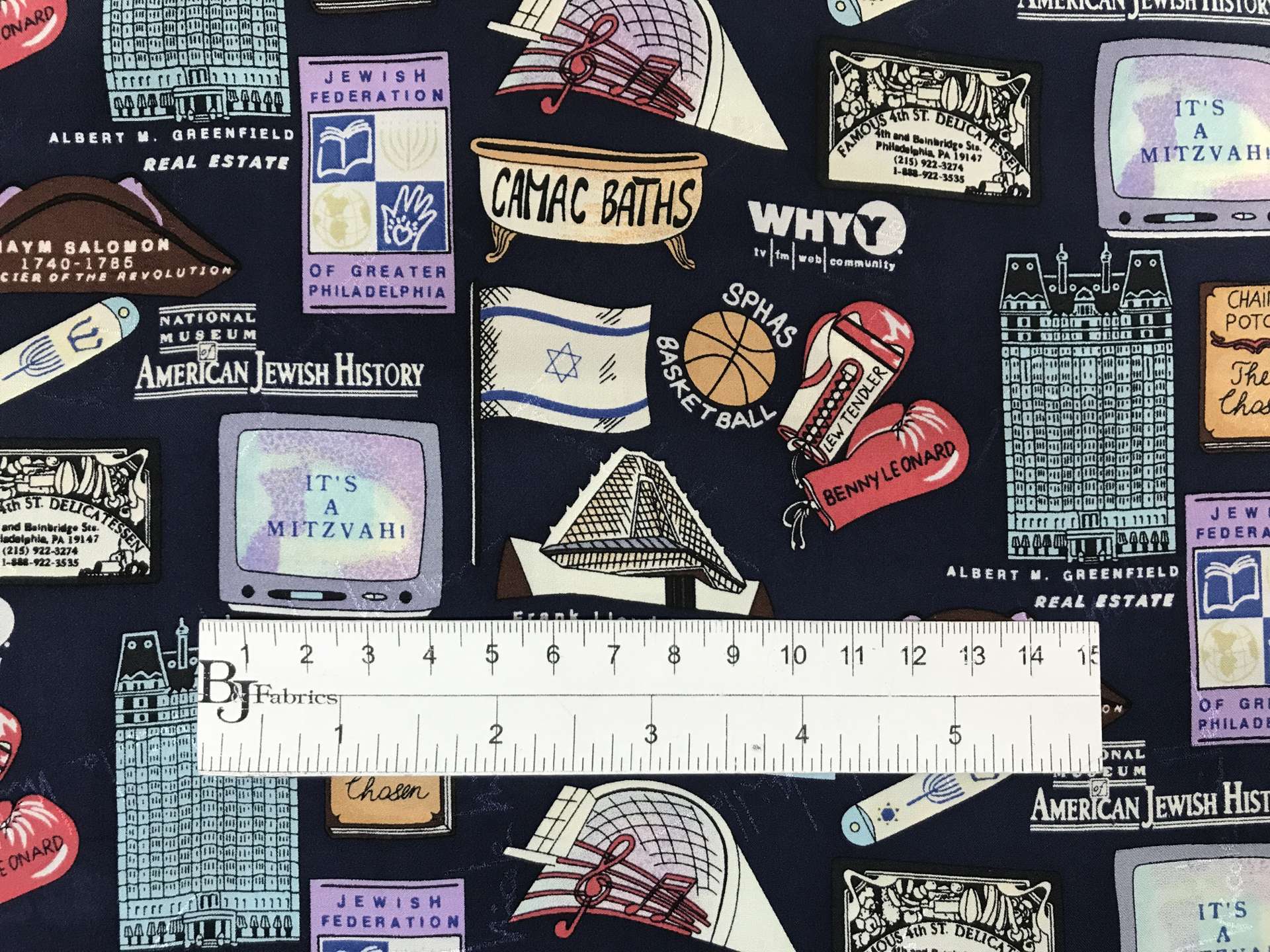 printed silk jacquard with jewish motifs with ruler to show scale