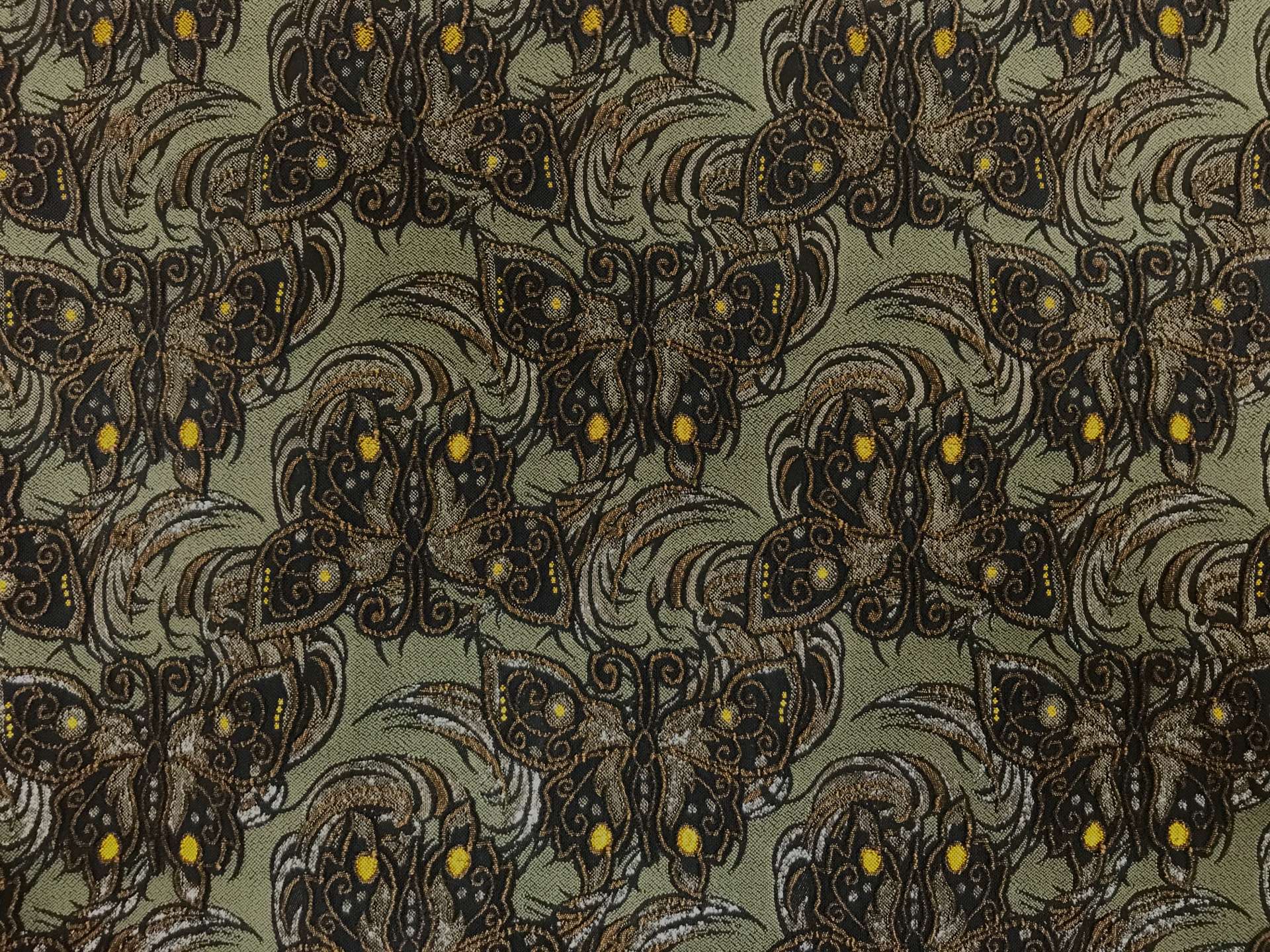 dark green stretch brocade with repeating butterfly pattern