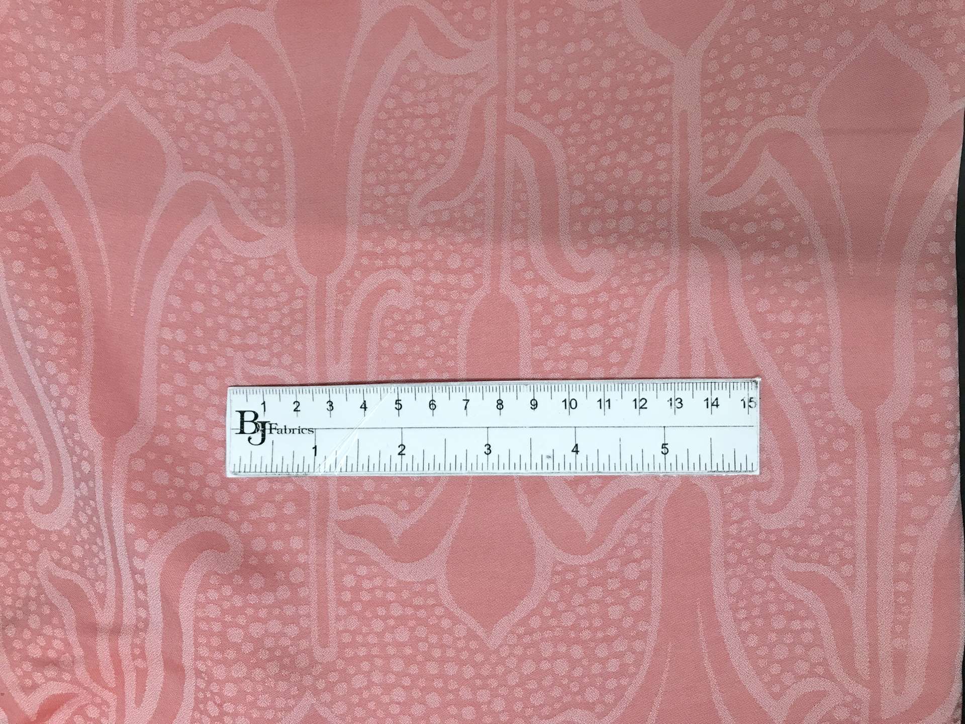 Italian Silk Georgette Jacquard in Red with ruler to show scale