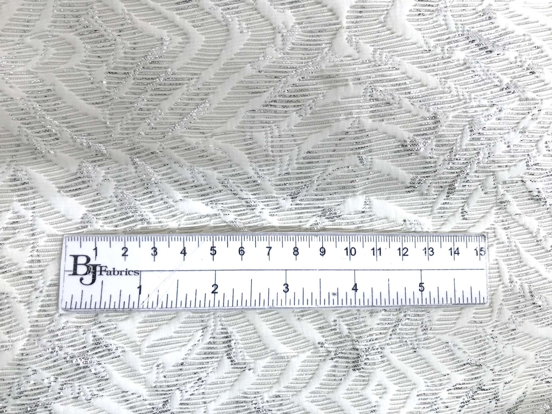 Italian Eggshell Brocade with Abstract Leaf Patterns with ruler to show scale