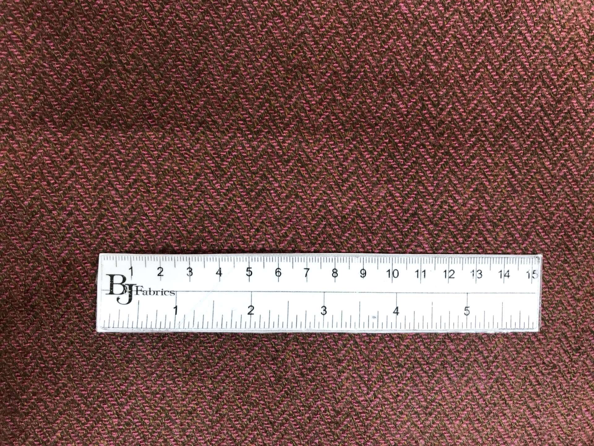 Italian Wool and Polyester Woven Zig Zag in brown and pink with ruler to display scale