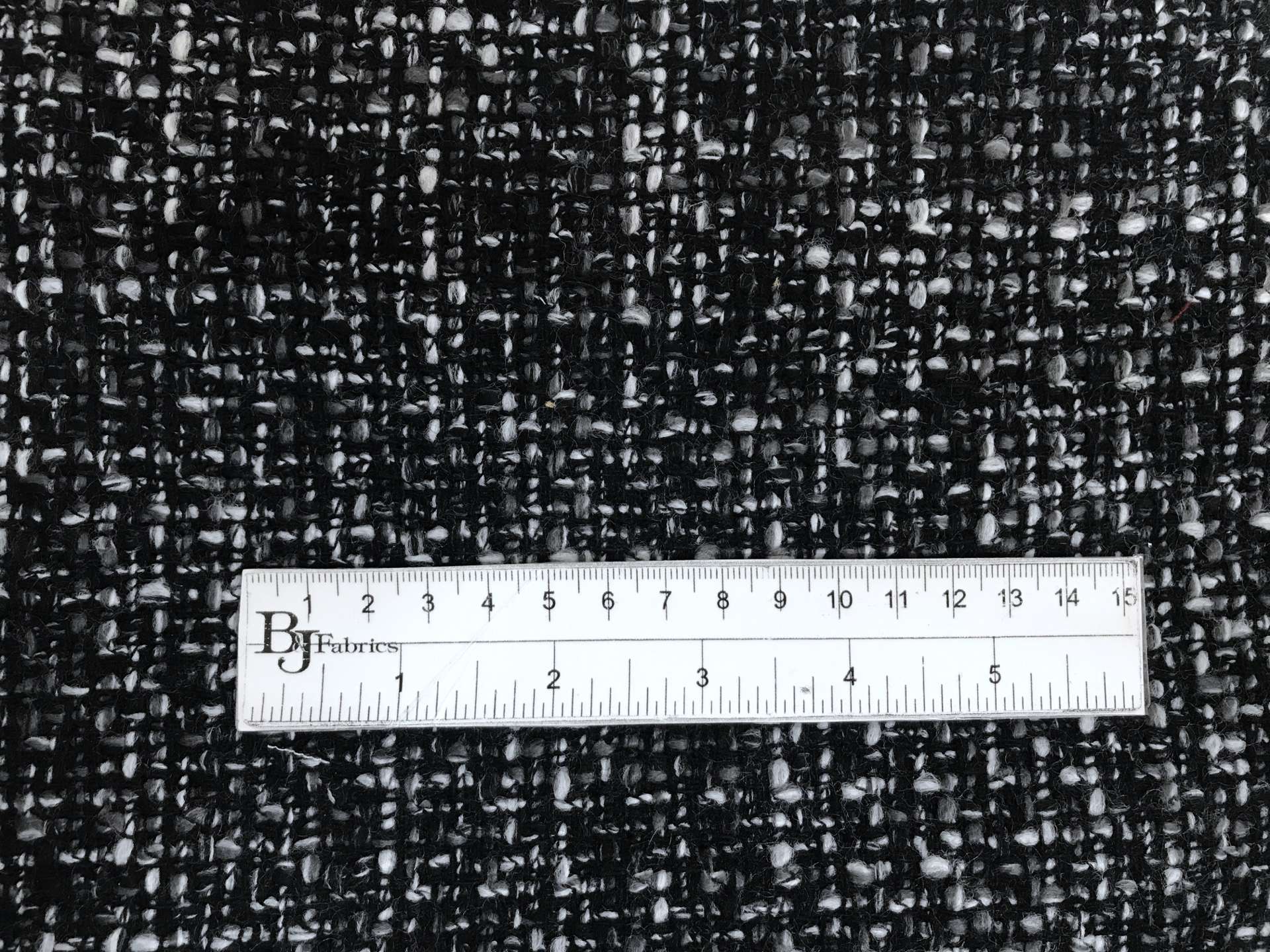 Italian Wool and Polyester Tweed and Black and Grey with ruler to show scale