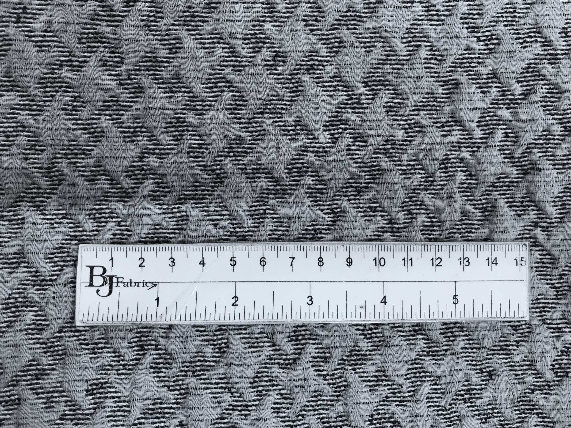 Silk Blend Novelty Brocade with Houndstooth Pattern with ruler to show scale