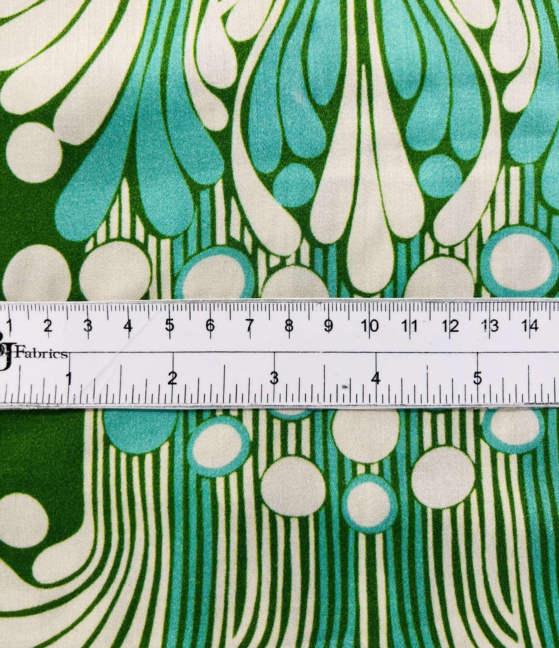 Printed Viscose Challis Sateen on Green Ground