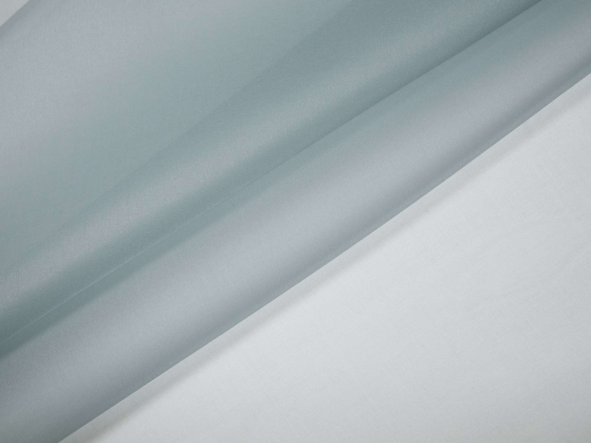 Solid organza in dusty blue folded