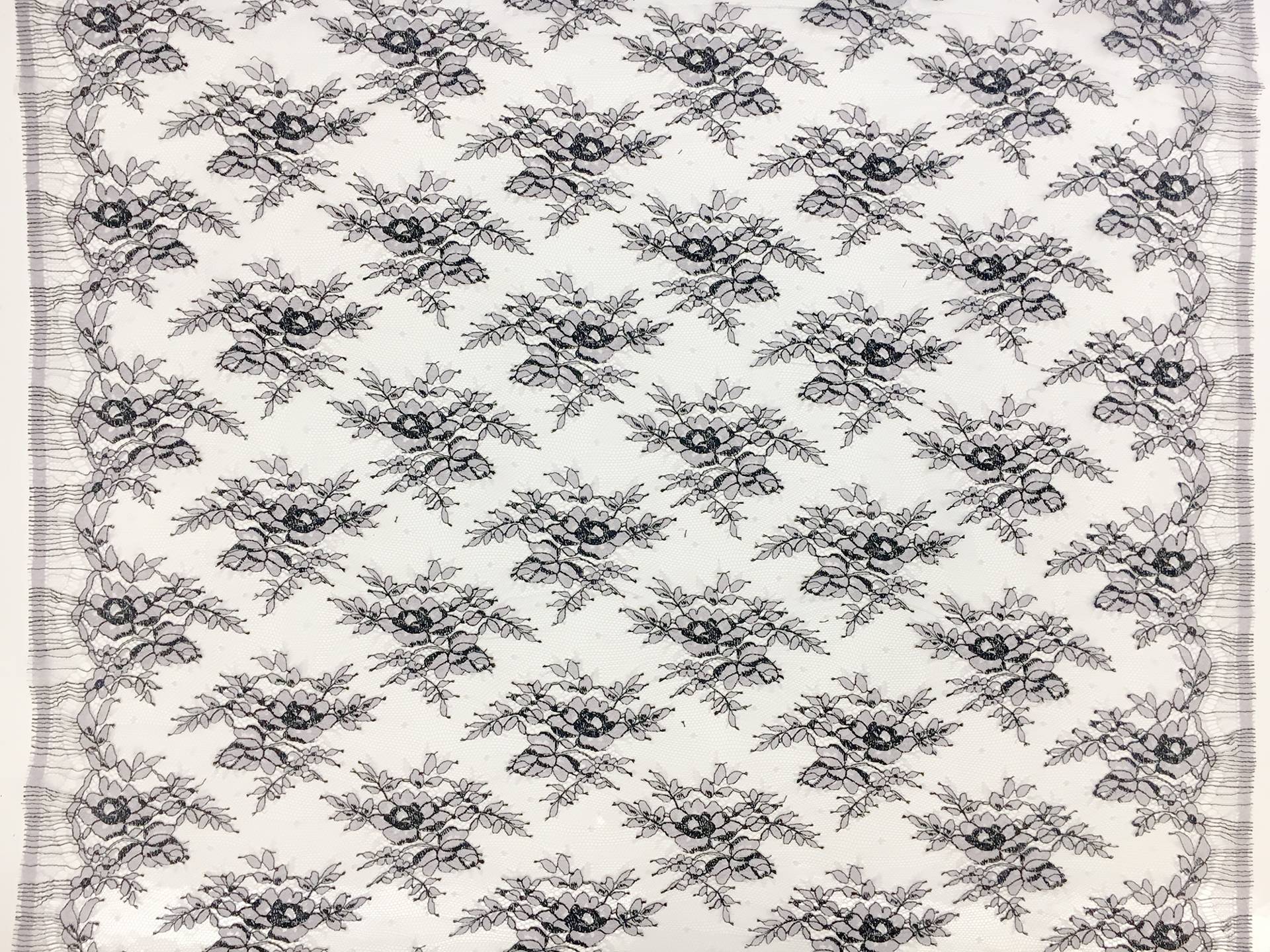 Chantilly Lace in Light Lavender with Black Outlines of Florals