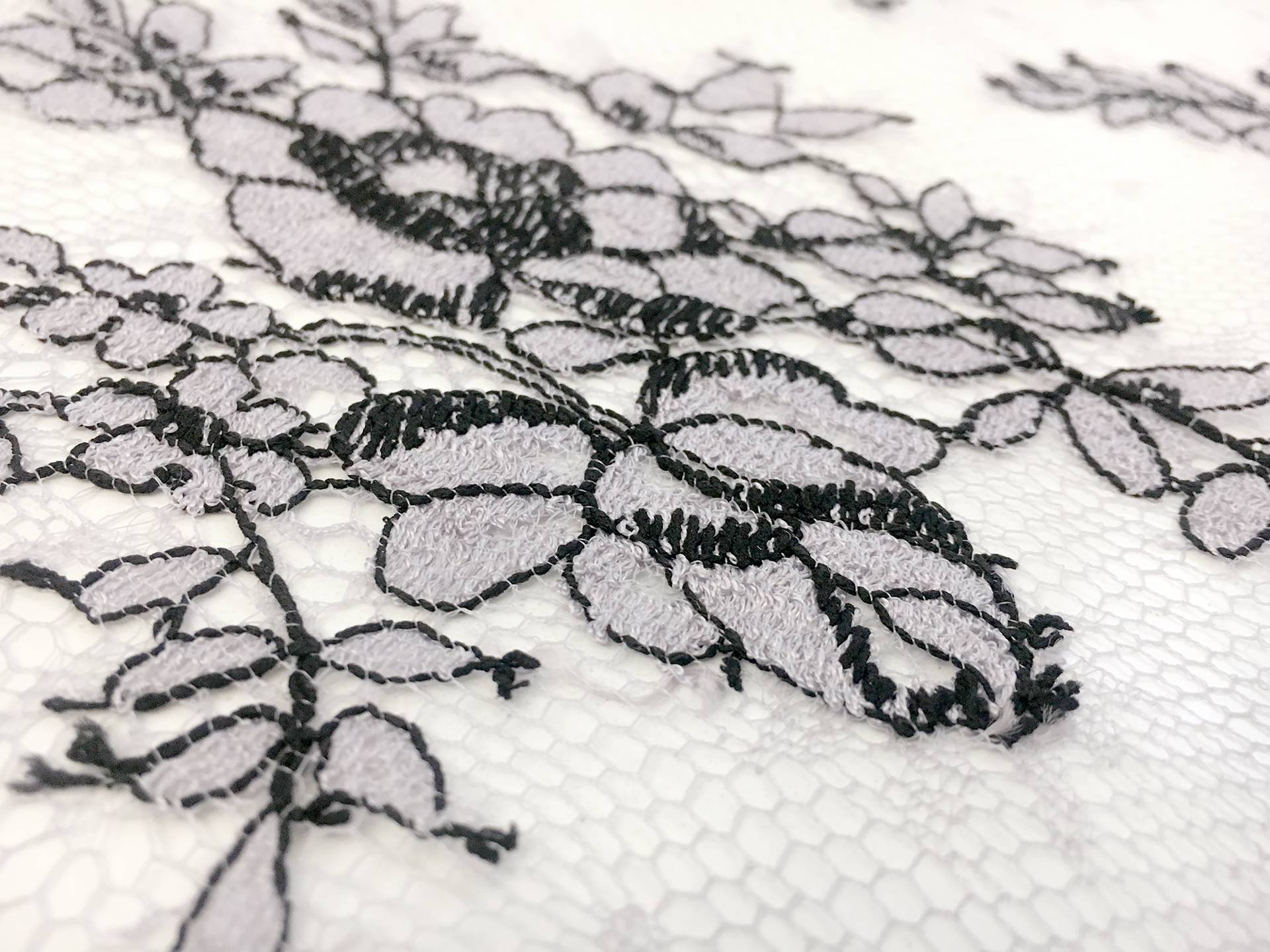Chantilly Lace in Light Lavender with Black Outlines of Florals