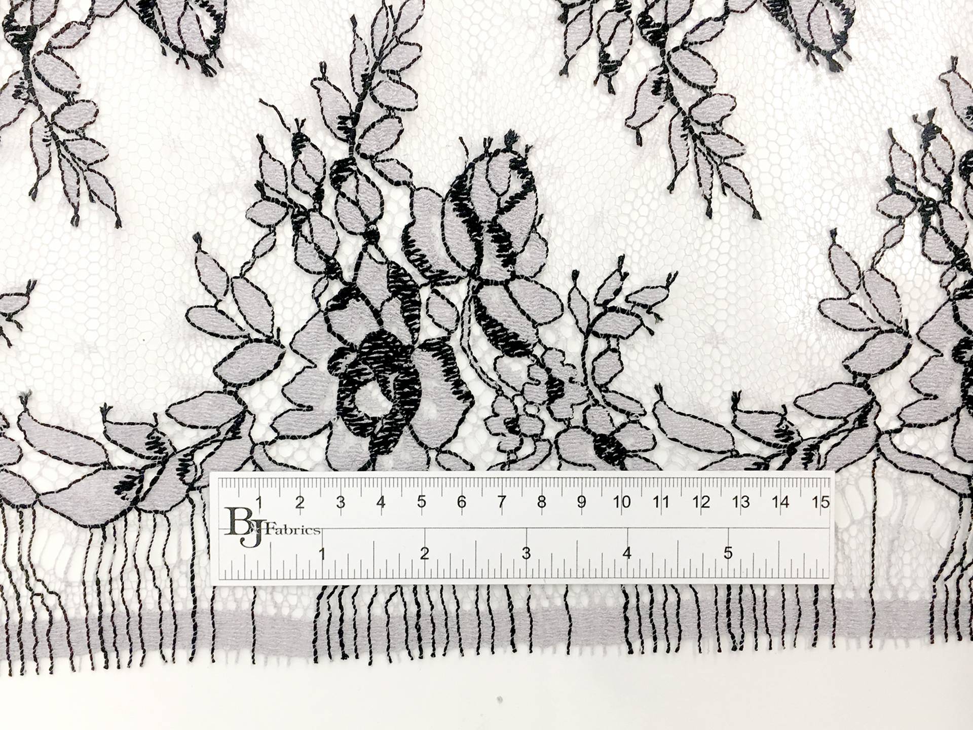 Chantilly Lace in Light Lavender with Black Outlines of Florals