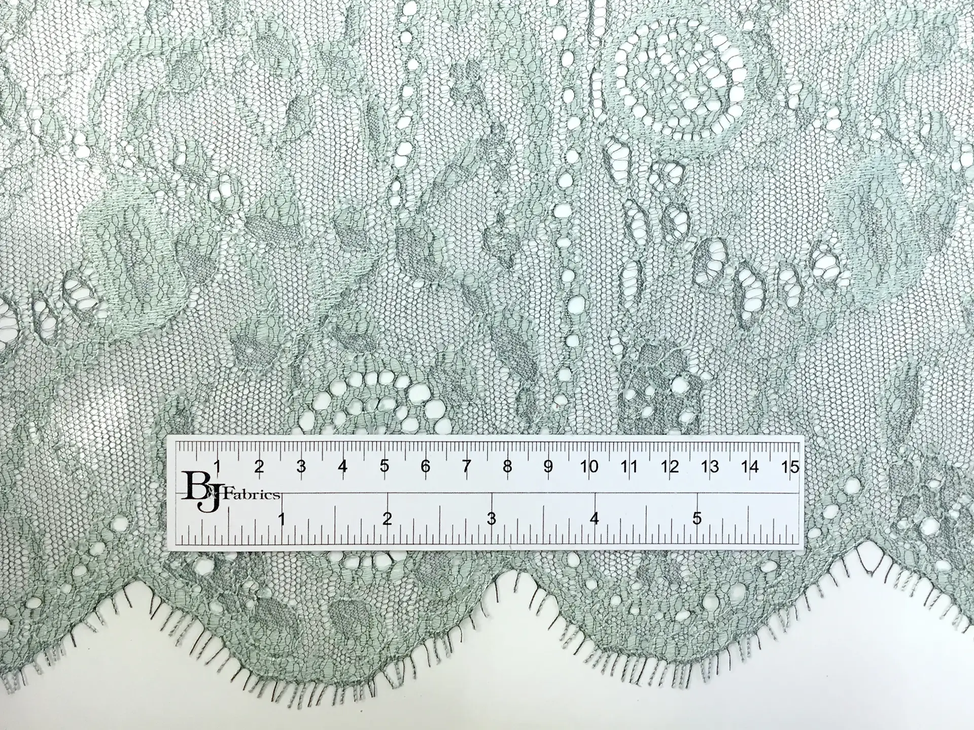 French Chantilly Lace with Circles and Floral Motifs in Sea Green and Black