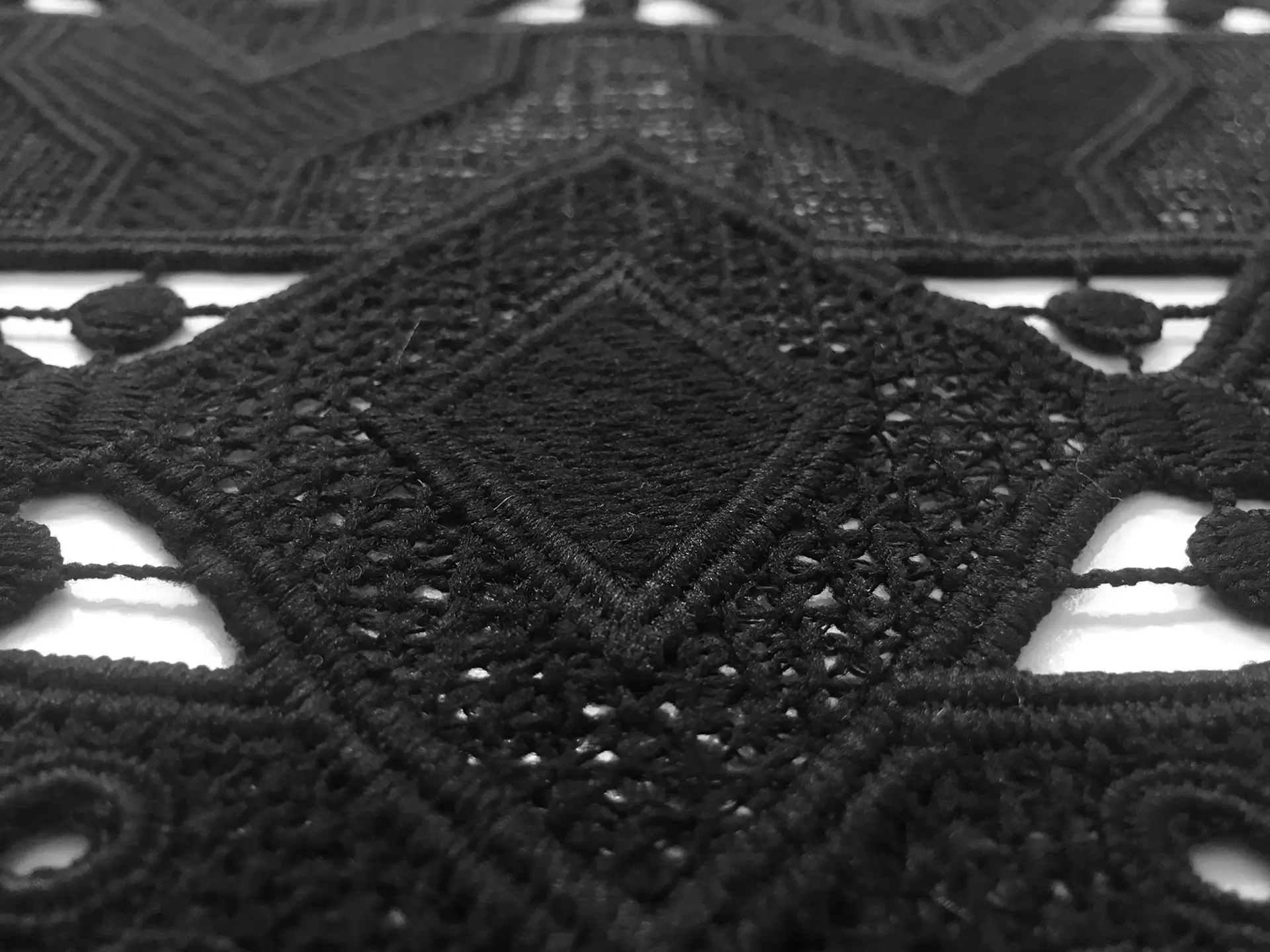 Guipure Lace with Interlocking Diamond Motif in Black
