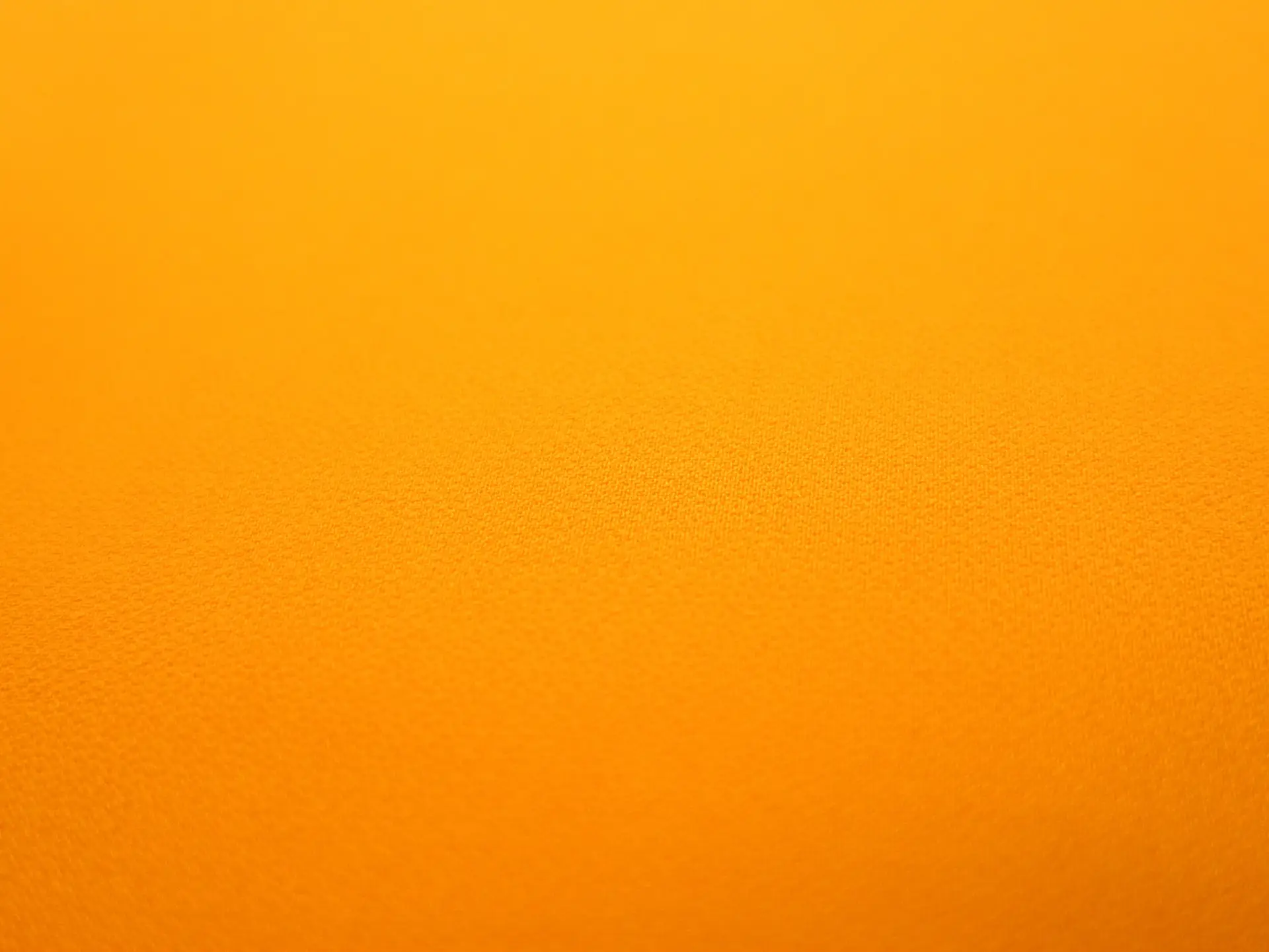 Polyester Stretch Crepe in Bright Carrot Orange