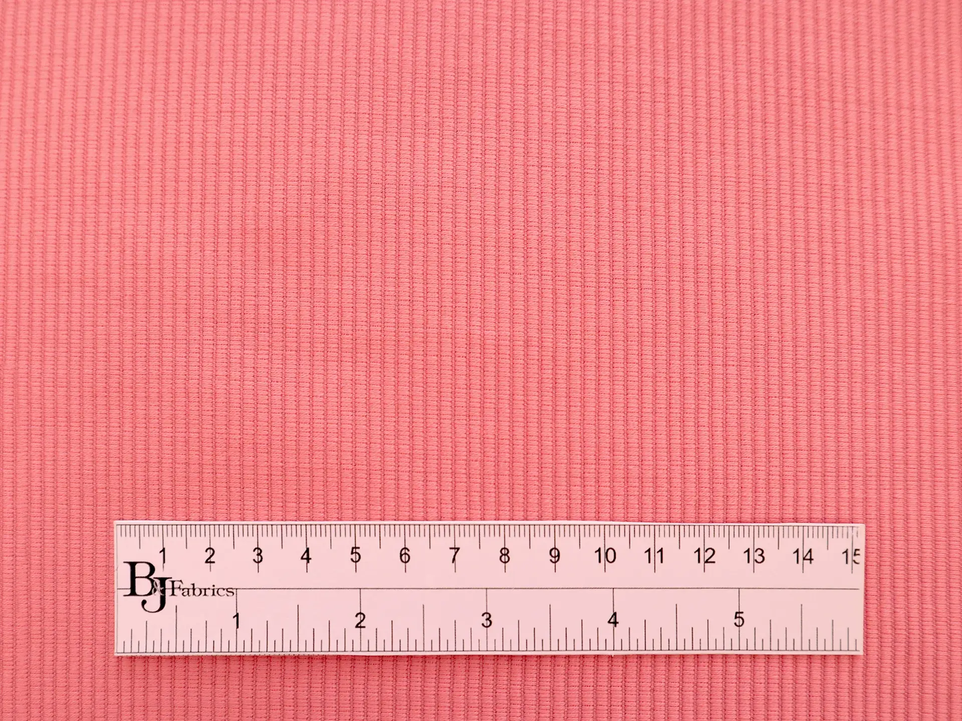 Calvin Klein Virgin Wool Ottoman in Coral