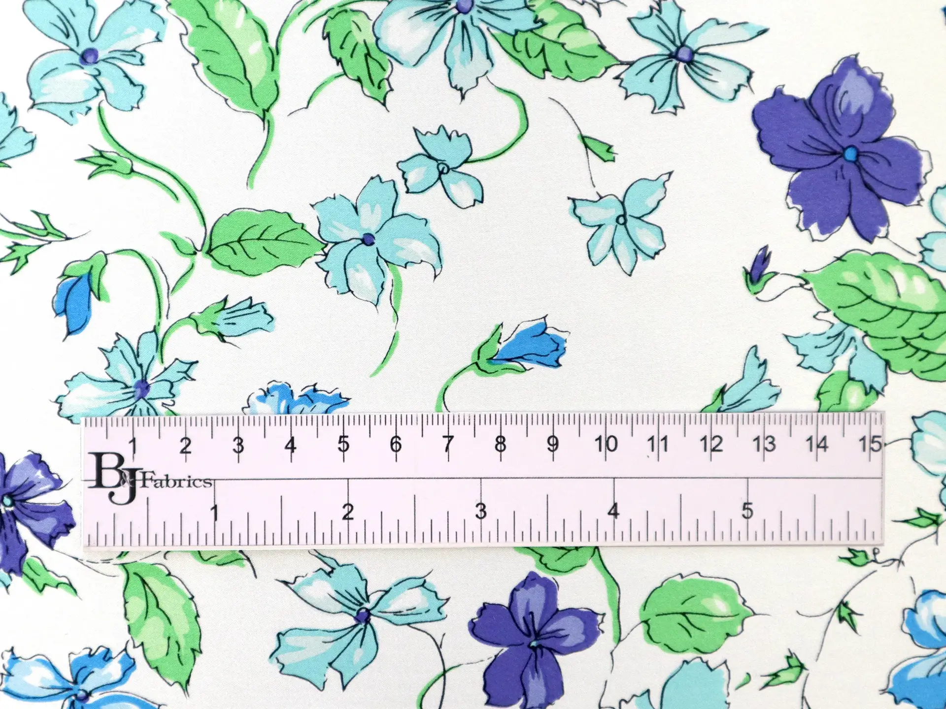 Printed Silk Charmeuse with Floral Pattern on Blue Green Background