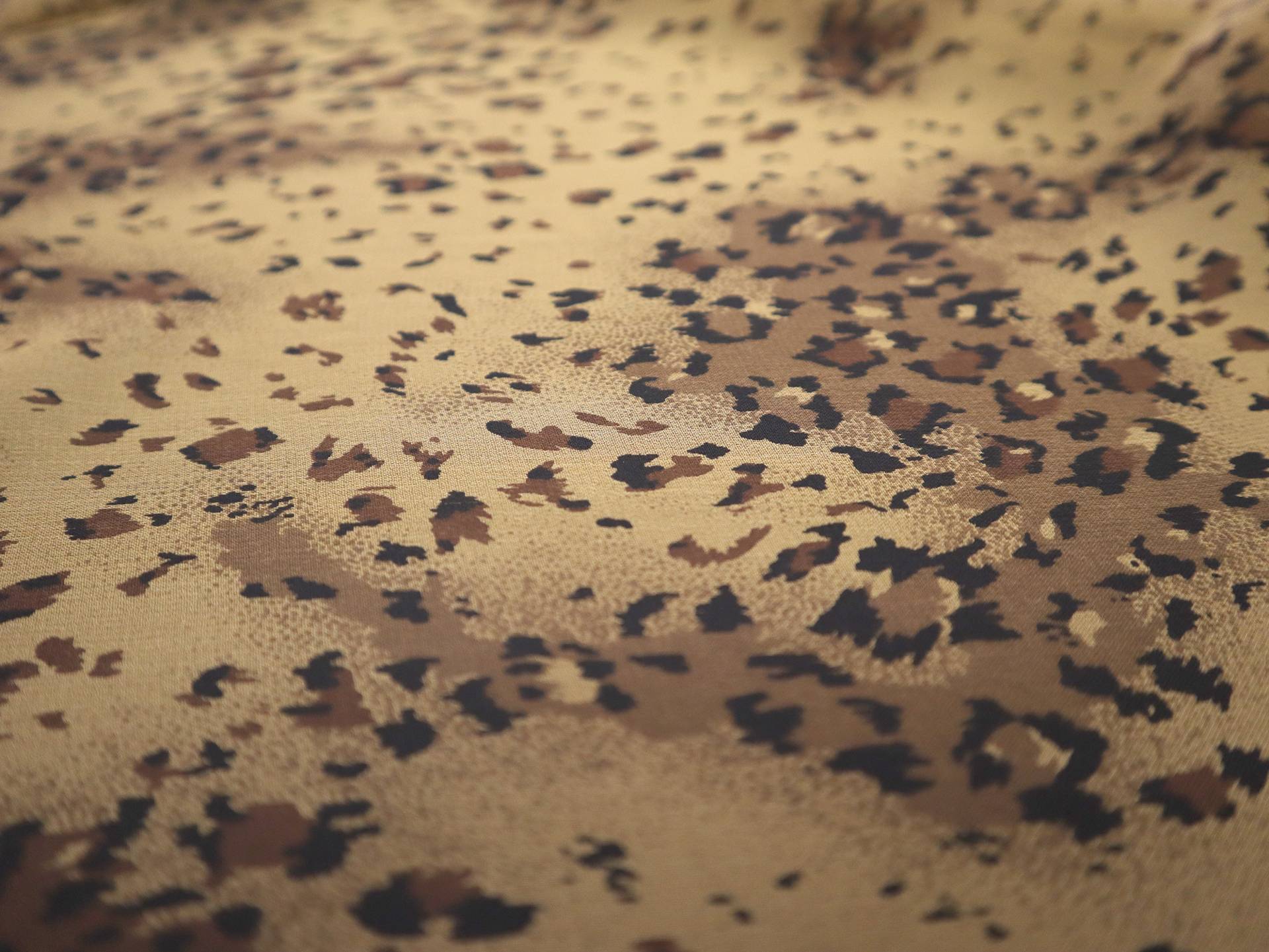 Printed Silk Chiffon with Leopard Spots Animal Print On Orange Background
