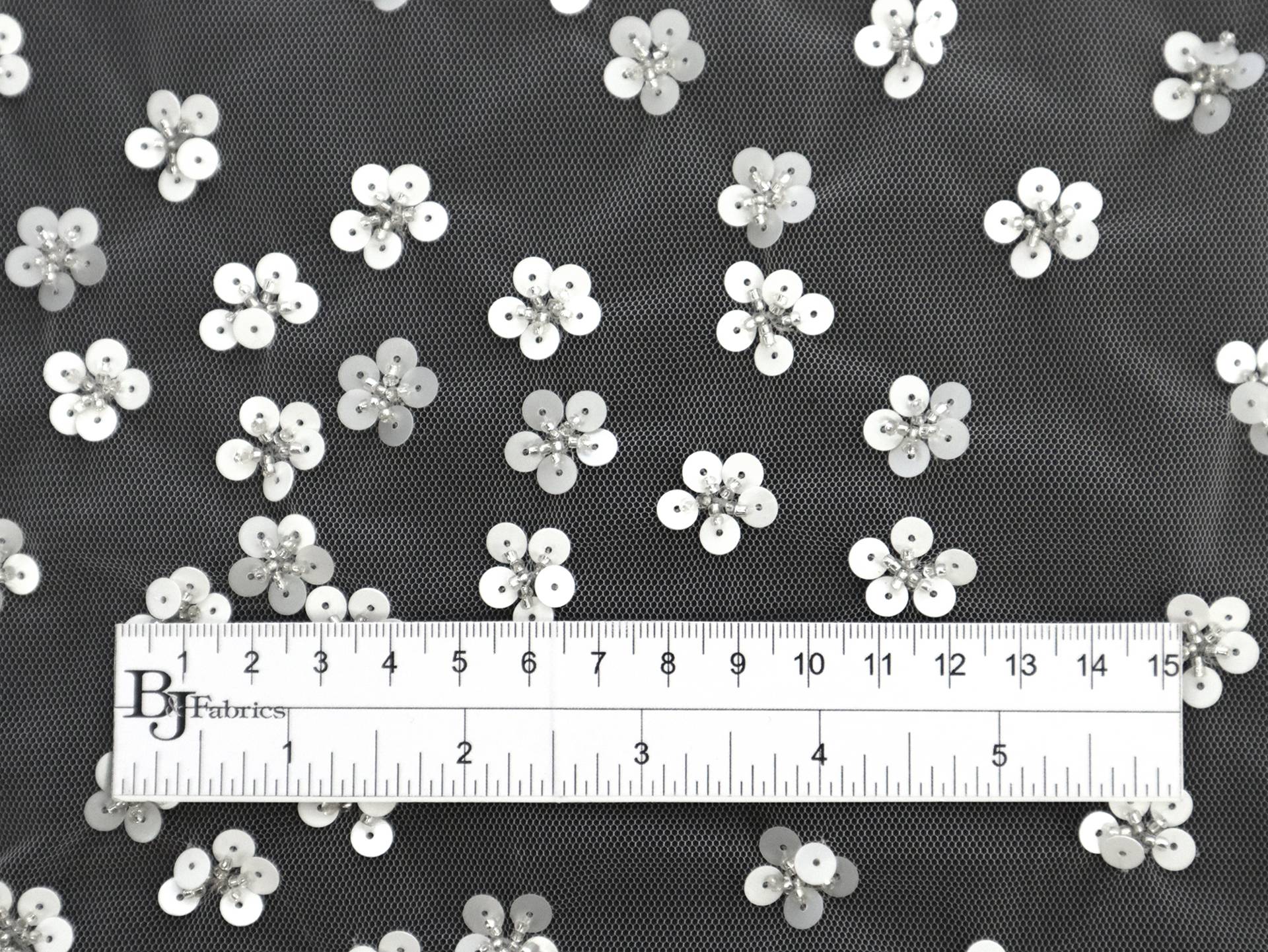 Novelty Sequined Flowers on Baby Pink Tulle