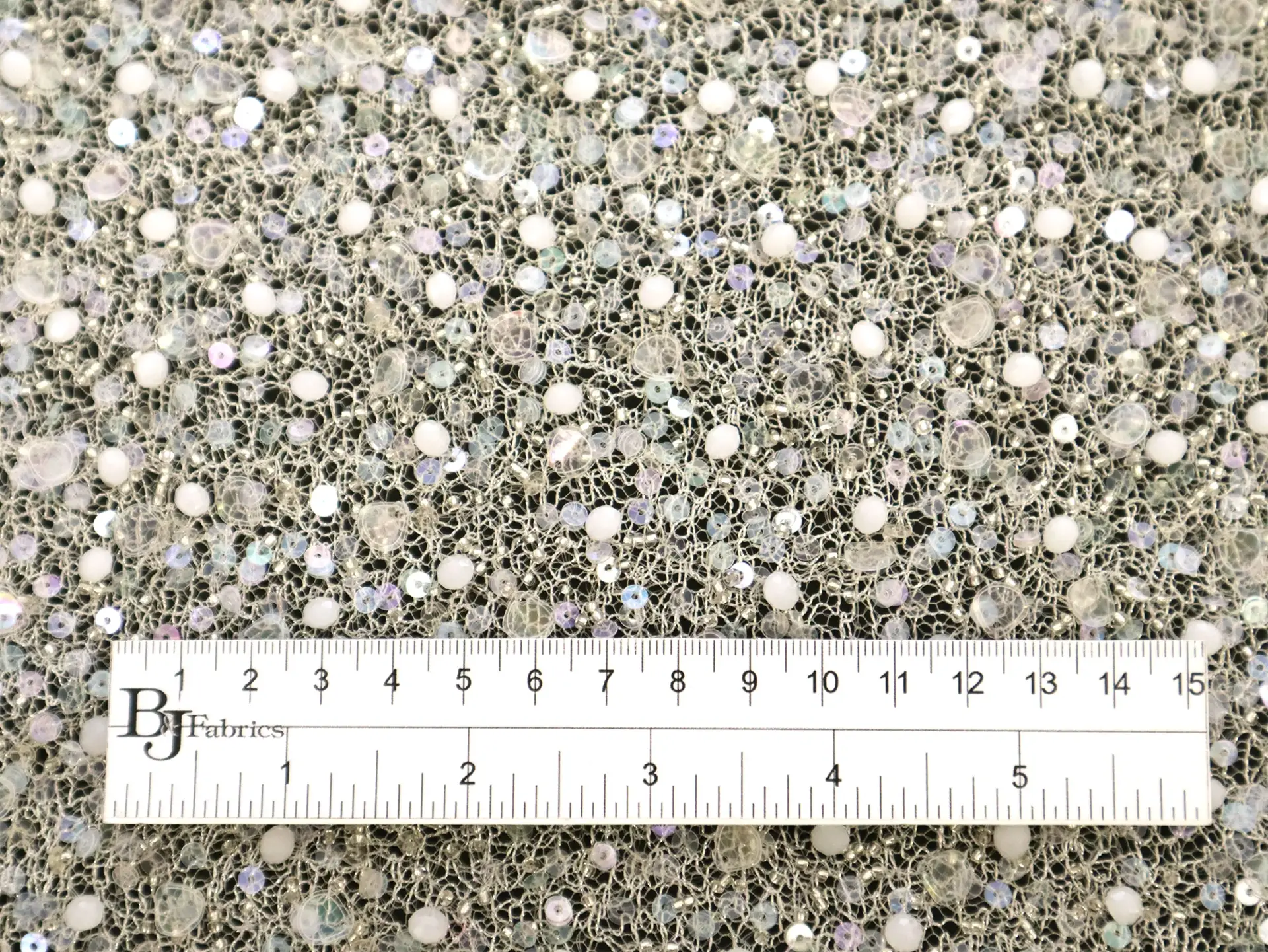 Novelty Beads and Sequins on Metallic Netting in Ivory 