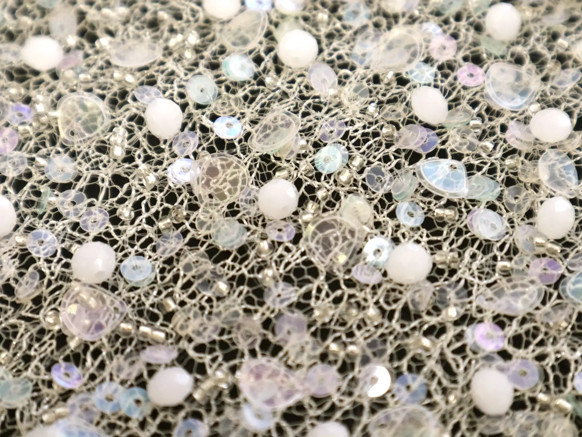 Novelty Beads and Sequins on Metallic Netting in Ivory 