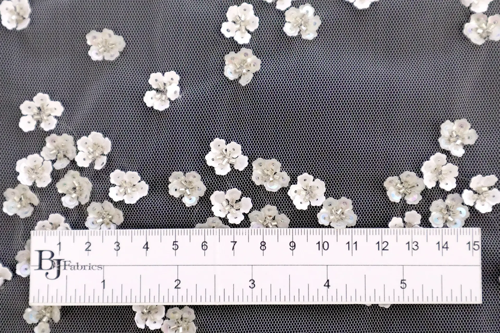 Novelty Sequined Flowers on Fuchsia Tulle
