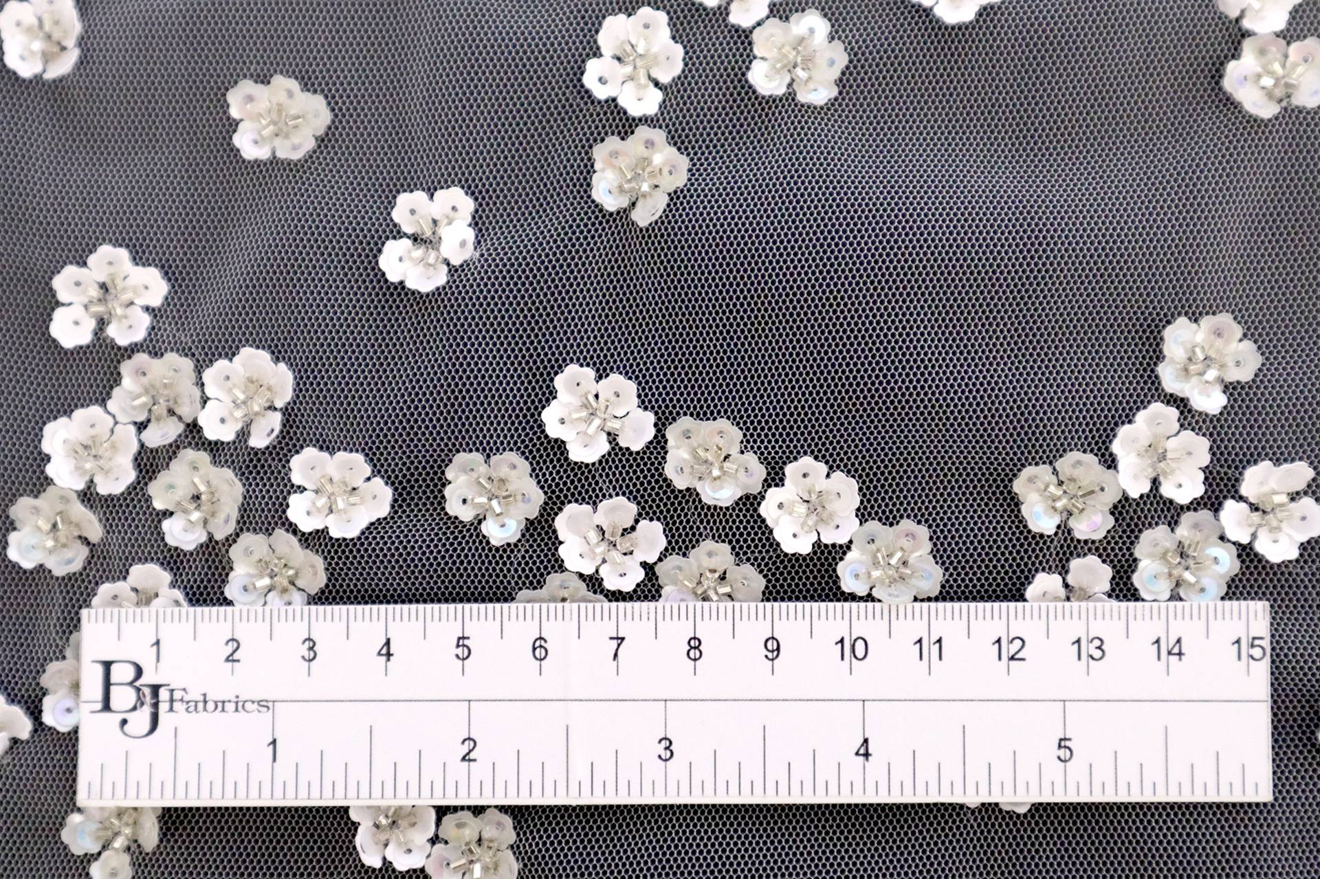 Novelty Sequined Flowers on Peach Tulle
