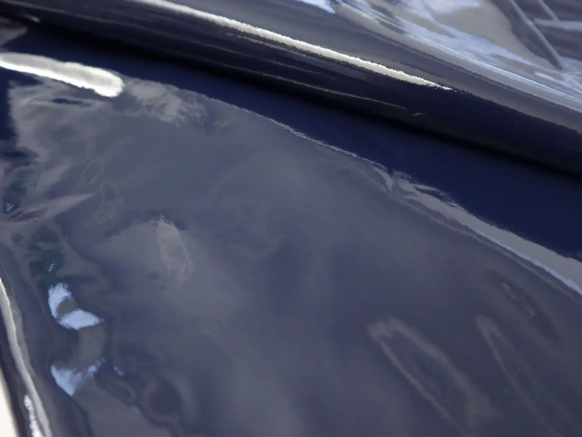 Fleece Knit Backed Wet Look Vinyl in Marine