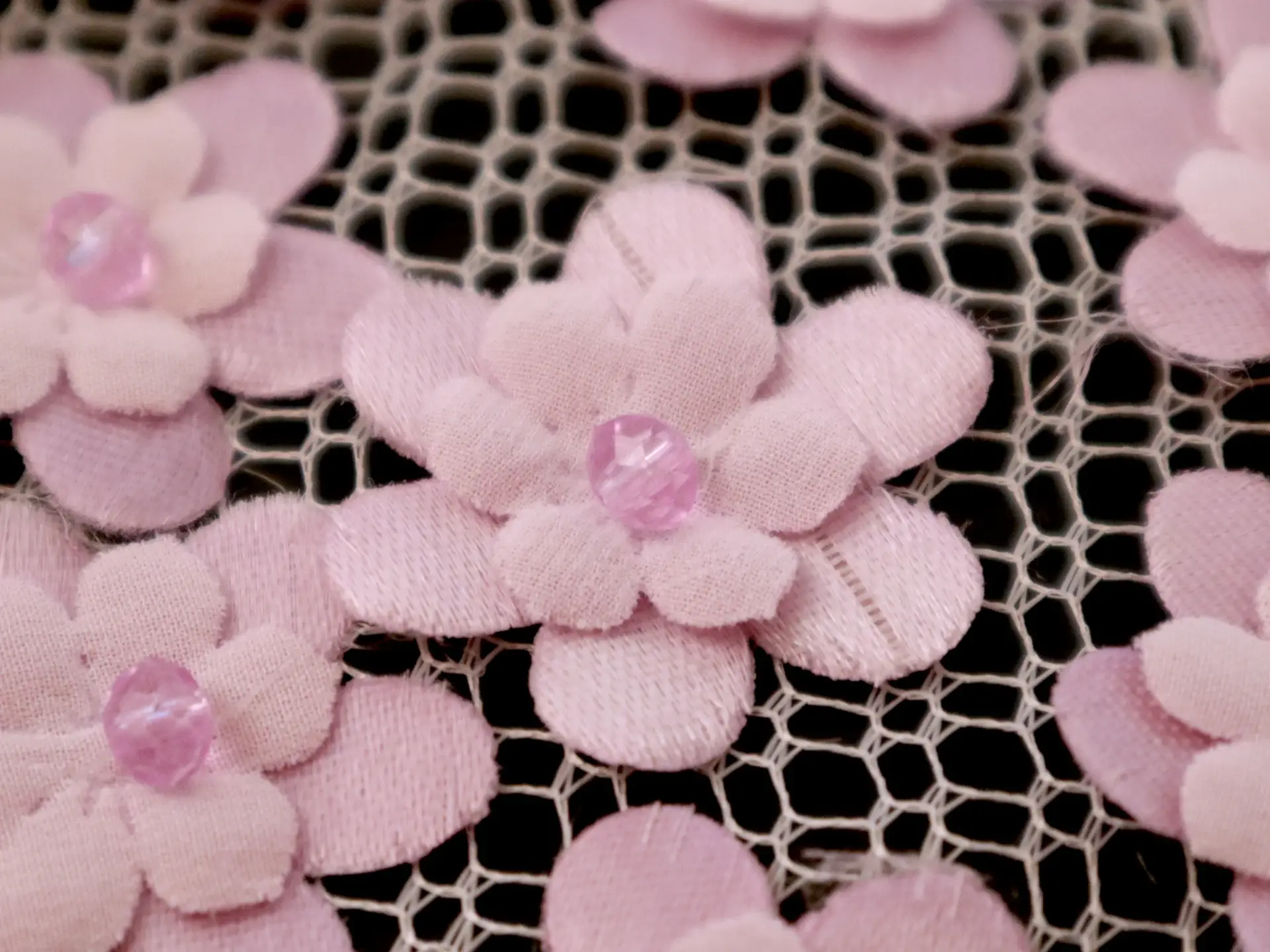 Mini Floral Appliqués on Netting in Orchid